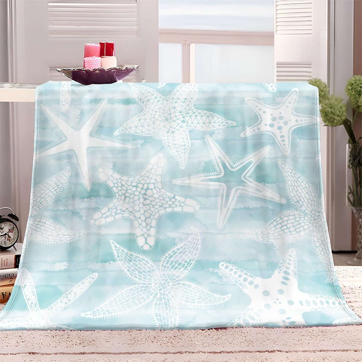 Couverture étoile de mer bleue 150x200 pour vos soirées canapé