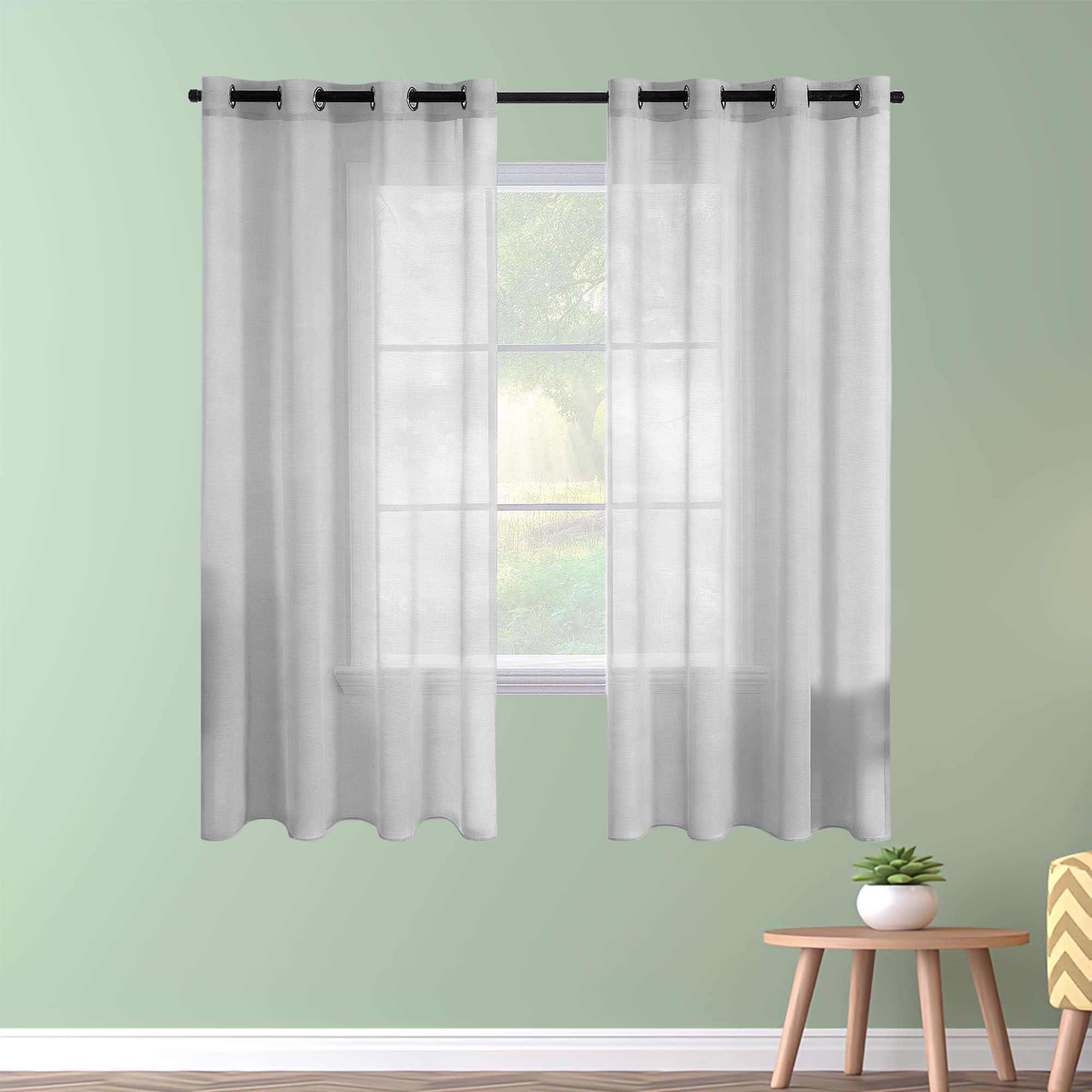 Rideaux voilage transparent filtrant pour tamiser la lumière du salon