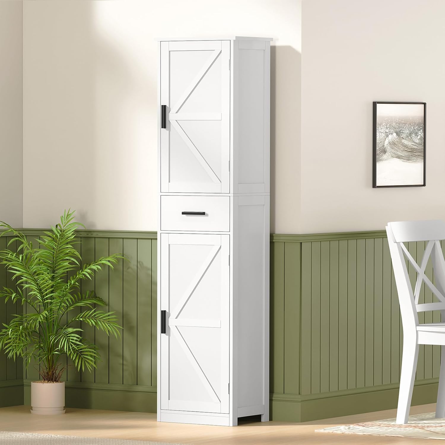 FIONESO cabinet in a living room setting with a plant and chair