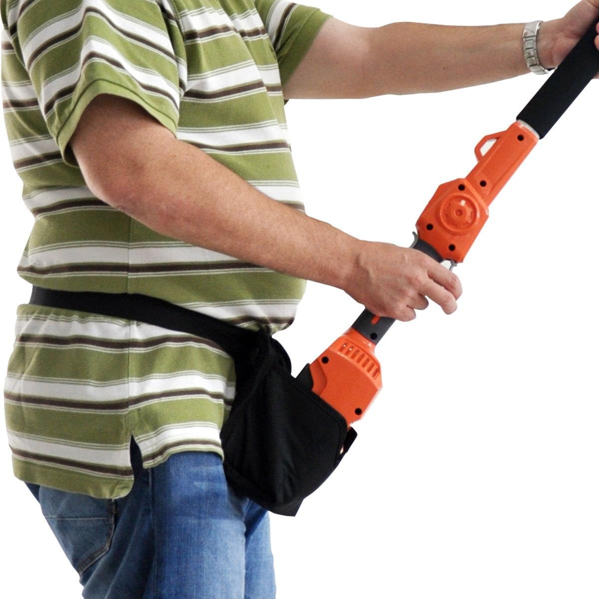 User demonstrating proper handling of the pole pruner with shoulder strap