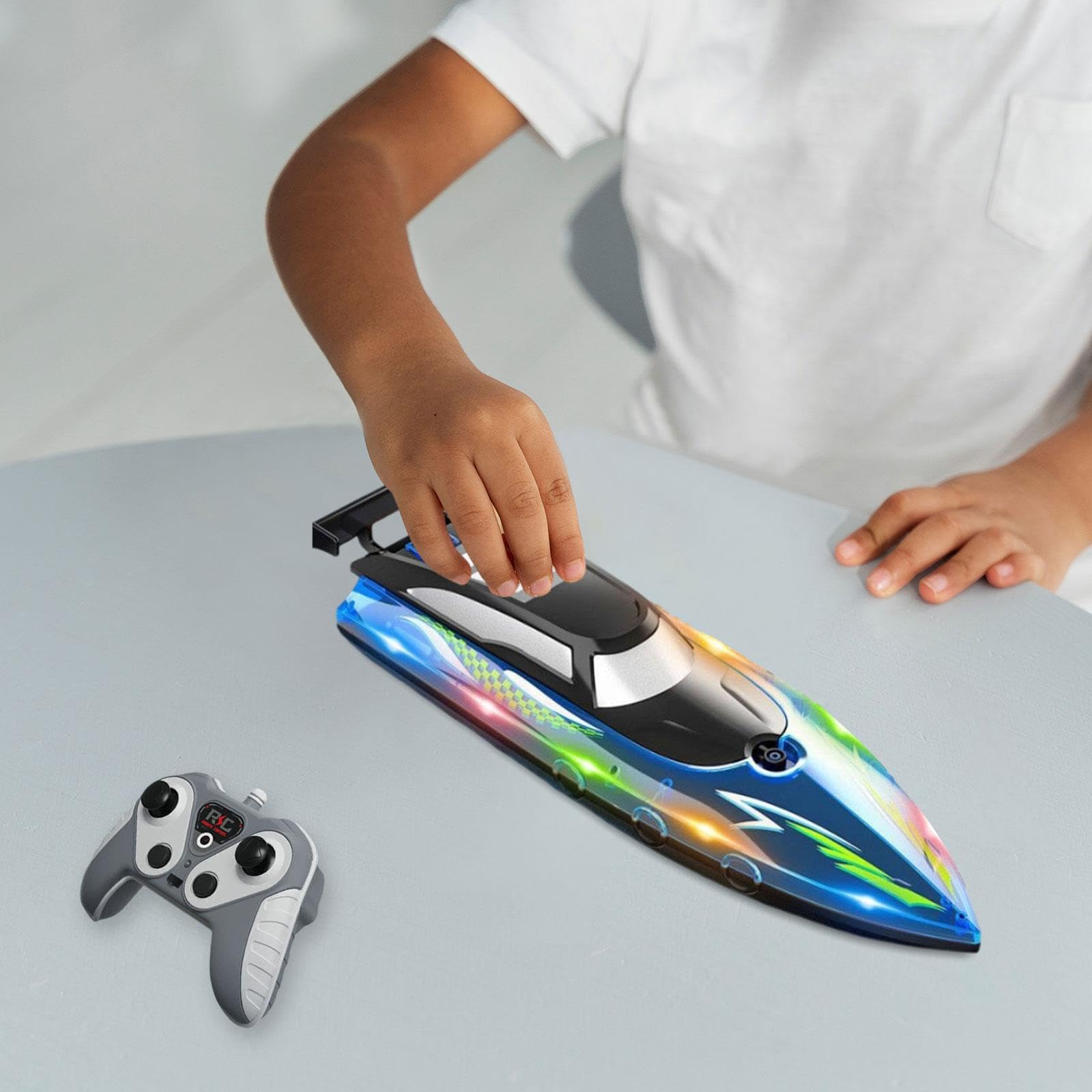 Lancha Teledirigida para Juegos Acuáticos, Embarcación Radiocontrolada para Niños, Modelo de Barco Rápido E Impermeable con Iluminación Integrada, Azul
