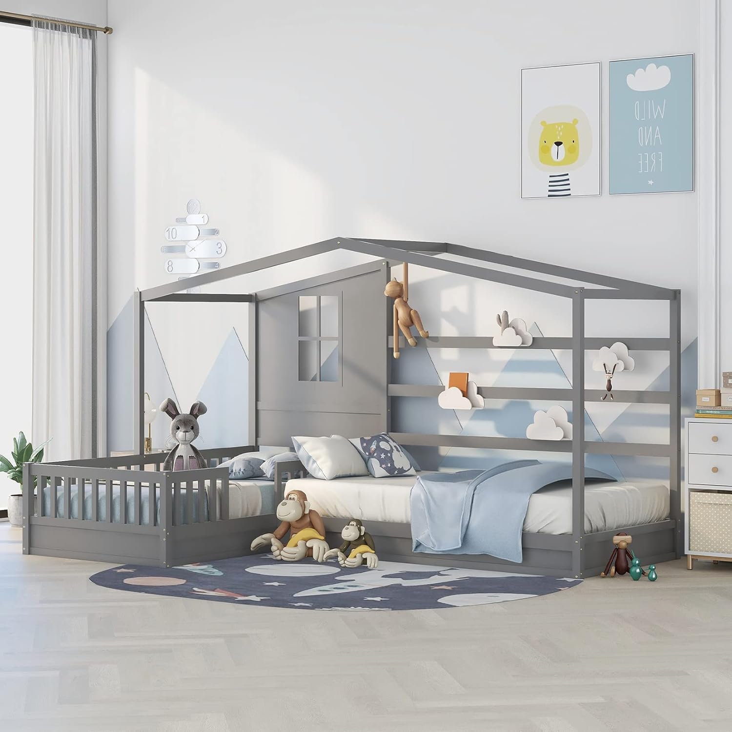 Fully assembled Bellemave L-shaped twin corner house bed in a decorated room.