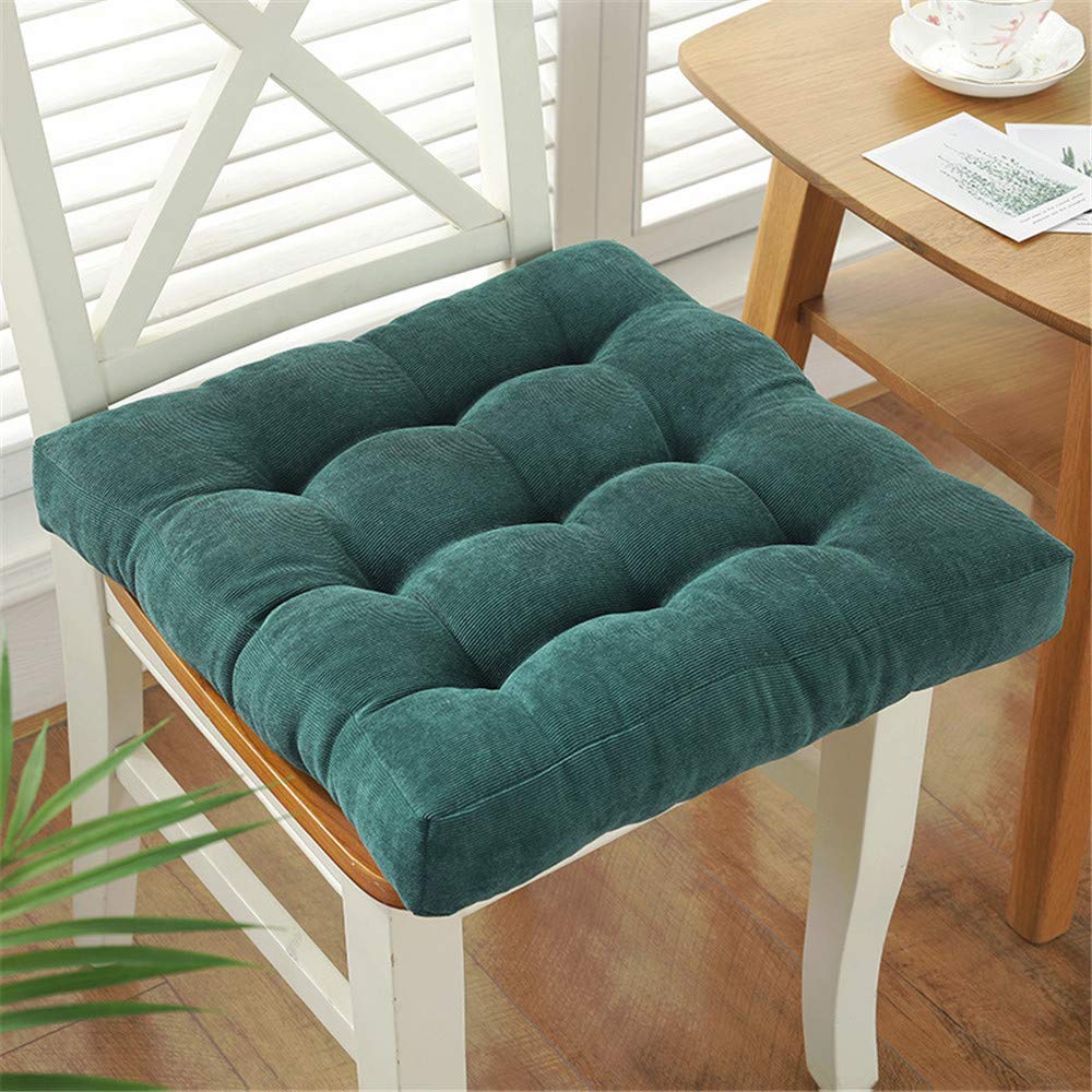Coussin de siège en velours vert pour partager des moments conviviaux sur votre terrasse