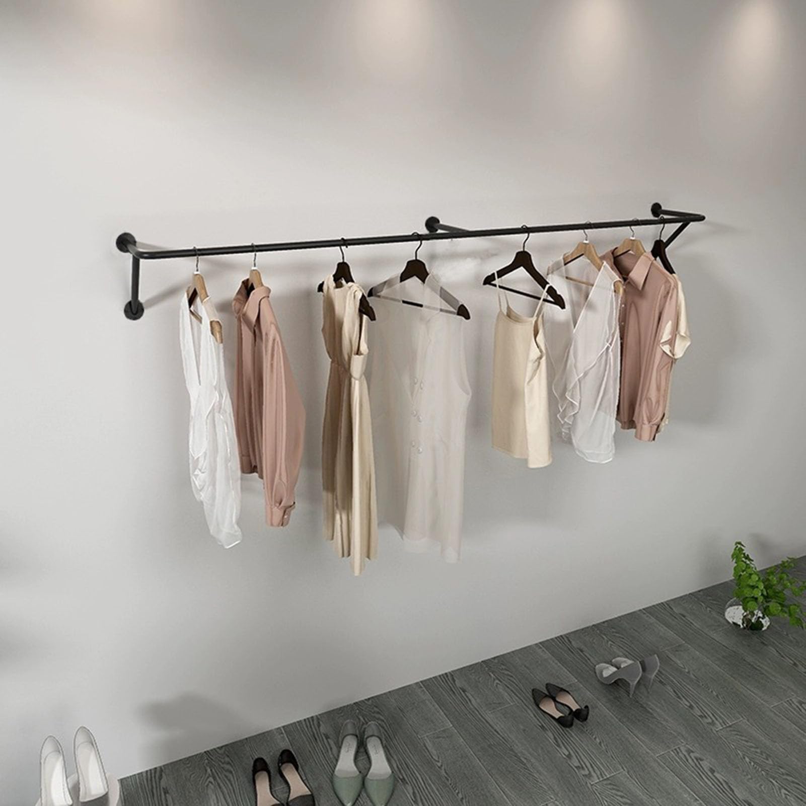 Rack de vêtements à pipe industrielle en métal robuste pour boutique vintage