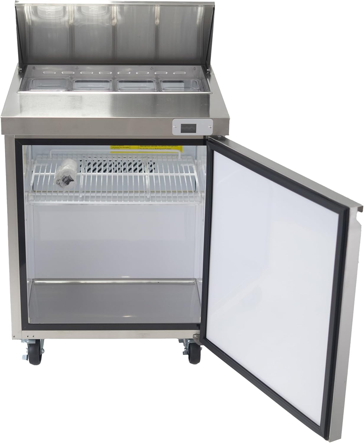 Pedalaman view of the refrigerated compartment of the Value Series Prep Table with the door open, showing the adjustable shelf.