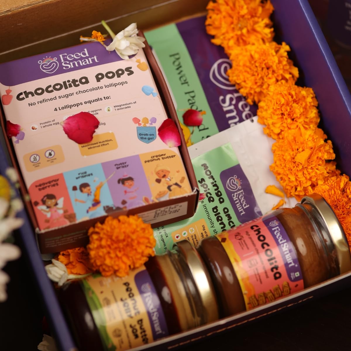 Feed Smart Gift Hamper | 5 Items Gift | Assorted With Chocolita Chocolate Spread | Peanut Butter Jelly Jam | Lollipops | Power Packed Seeds | Moringa & Amchur Powder | Healthy Gift Hamper for Kids (B0DHZGRJSJ) Amazon Price History, Amazon Price Tracker