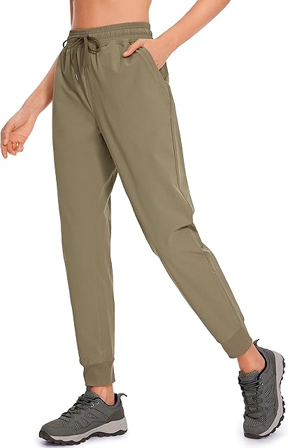 CRZ YOGA Calça de corrida feminina à prova d'água para golfe ao ar livre leve com bolsos com zíper 68,5 cm