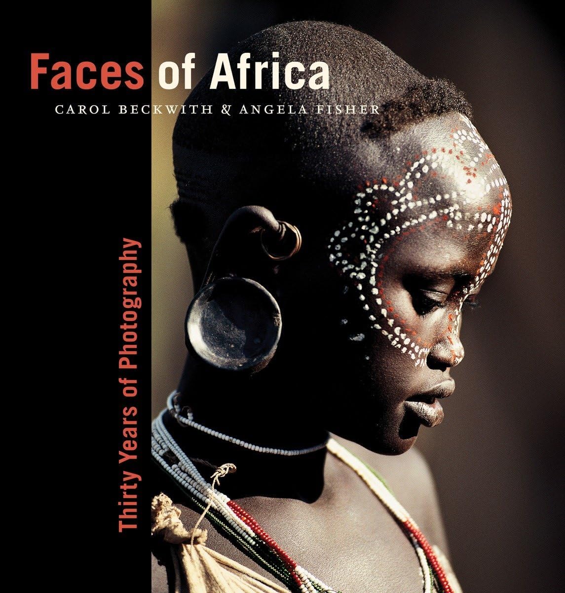 FACES OF AFRICA Hardcover – 6 January 2009