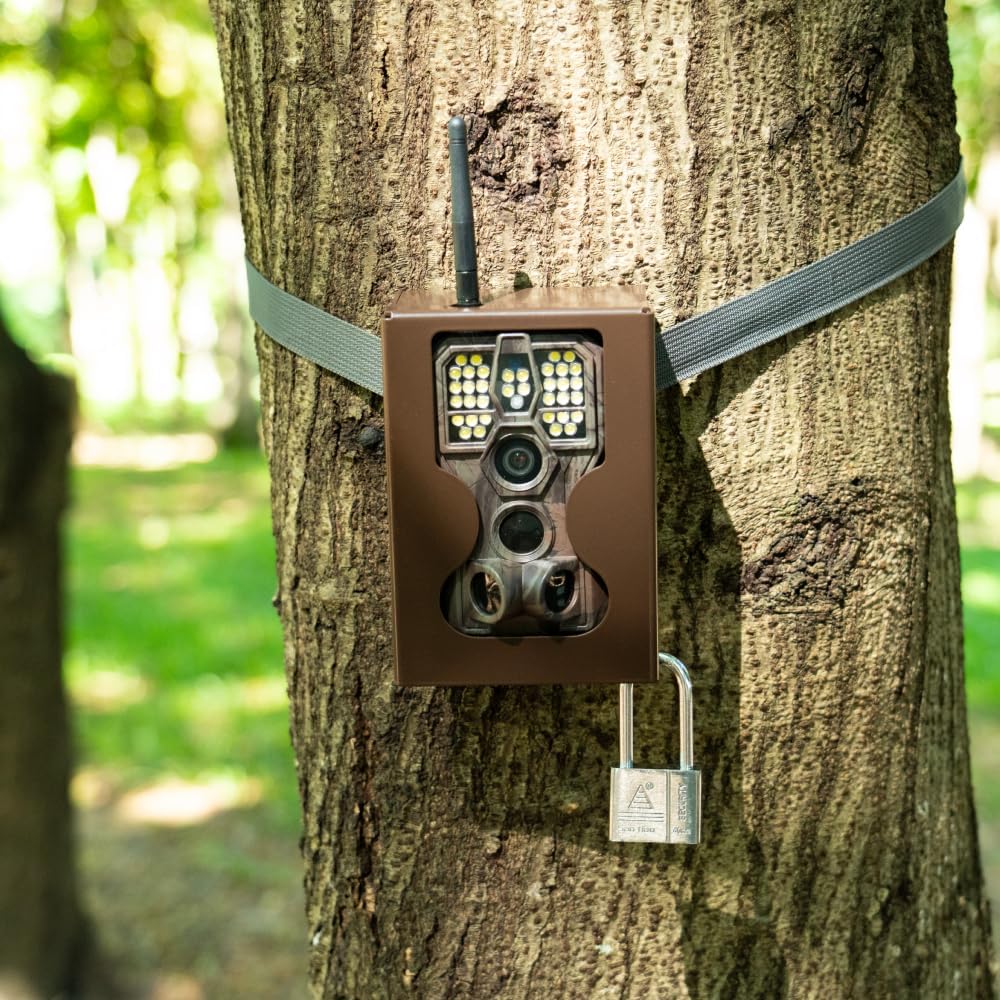 Hands inserting a rechargeable battery pack into the GardePro E8PWF trail camera