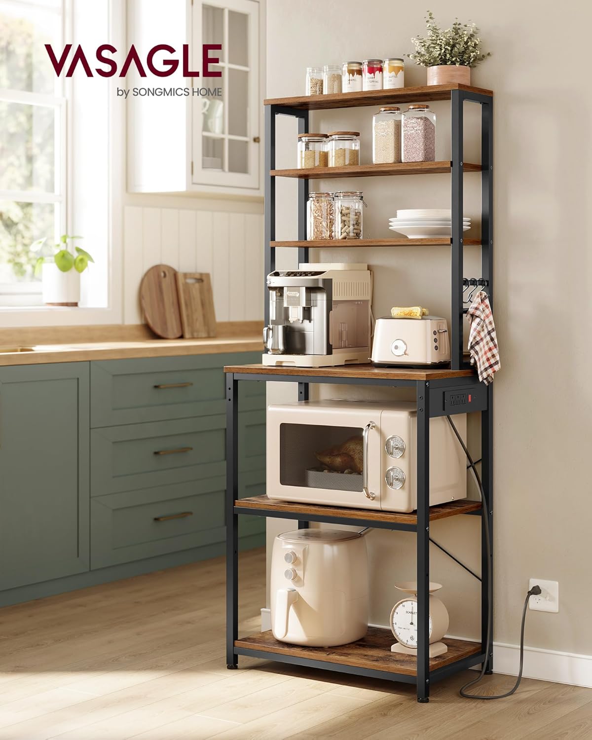 Assembled VASAGLE Bakers Rack with Power Outlet in a kitchen setting, holding various appliances and kitchen items.