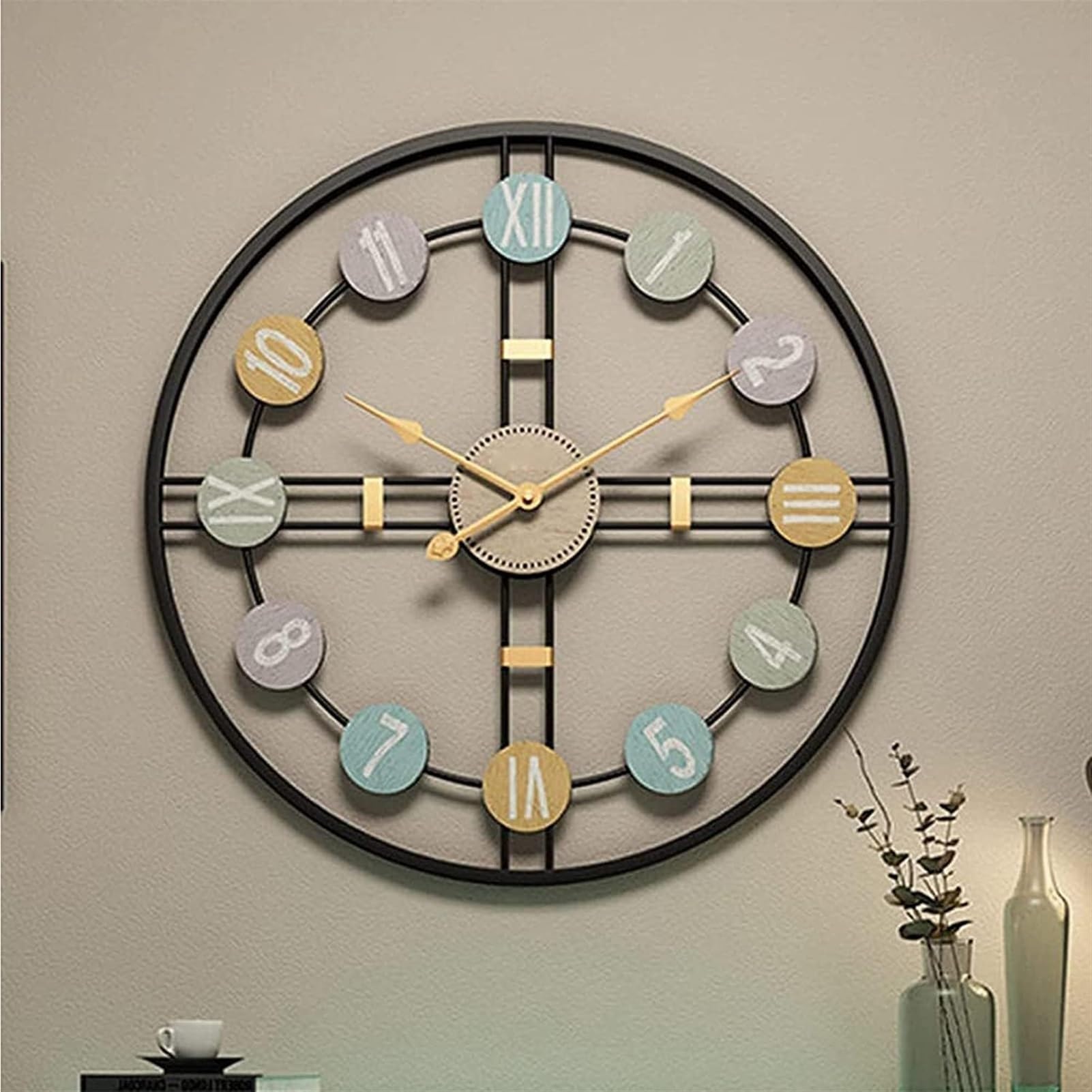 Horloge murale artistique au design moderne creux pour décorer votre séjour