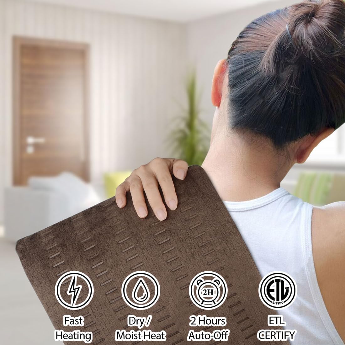 Woman applying the ZXU heating pad to her shoulder for targeted relief.
