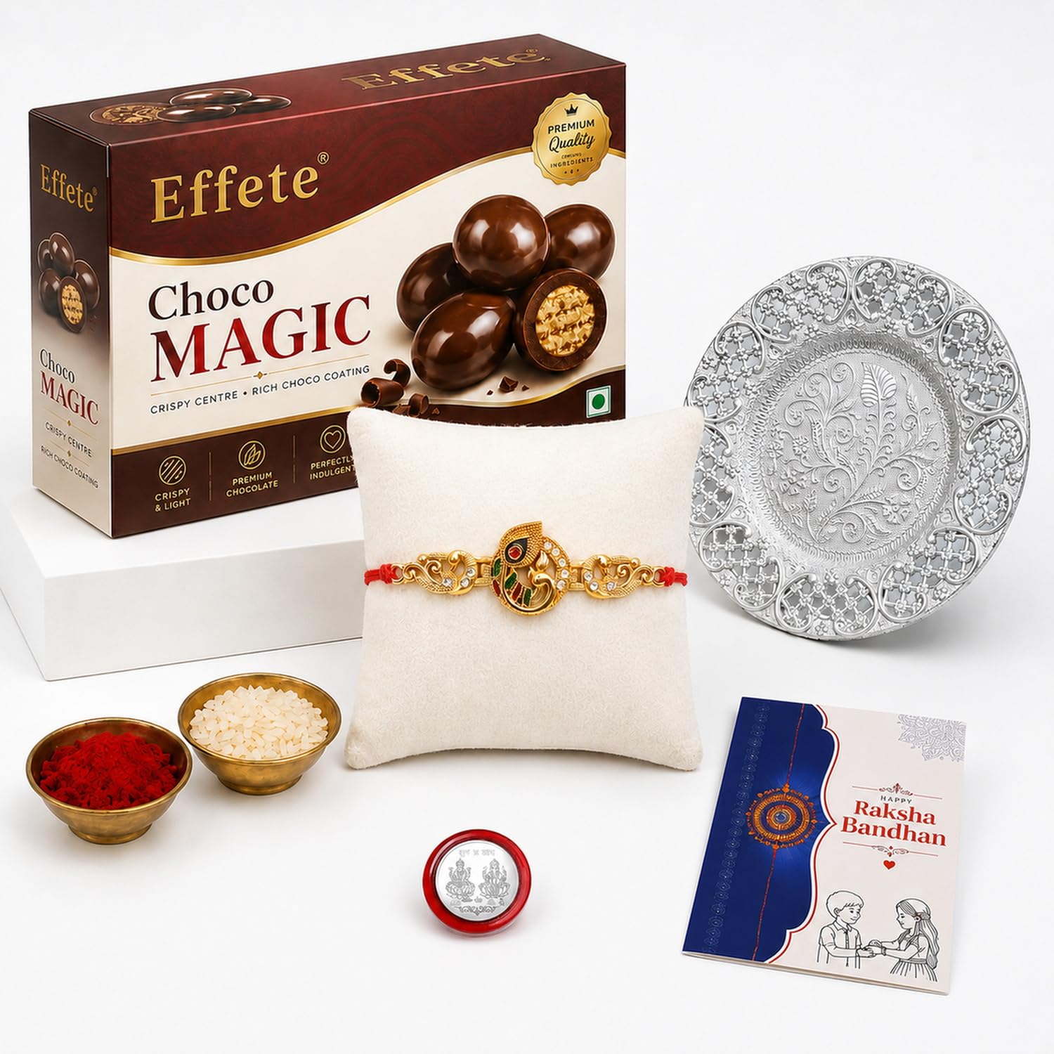 Vacalvers Deodap Multicolor Bracelet/Rakhi (K1_535_Cm32+Ds) & Effete Chocolate Almonds With Silver Color Pooja Coin, Roli Chawal & Greeting Card, Card And Chocolate, Set Of 1 Rakhi, 0.25 Kg