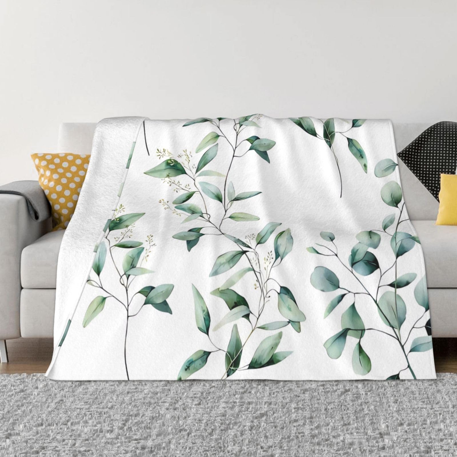 Couverture en flanelle blanche et légère motif brindilles pour vos moments cocooning sur canapé