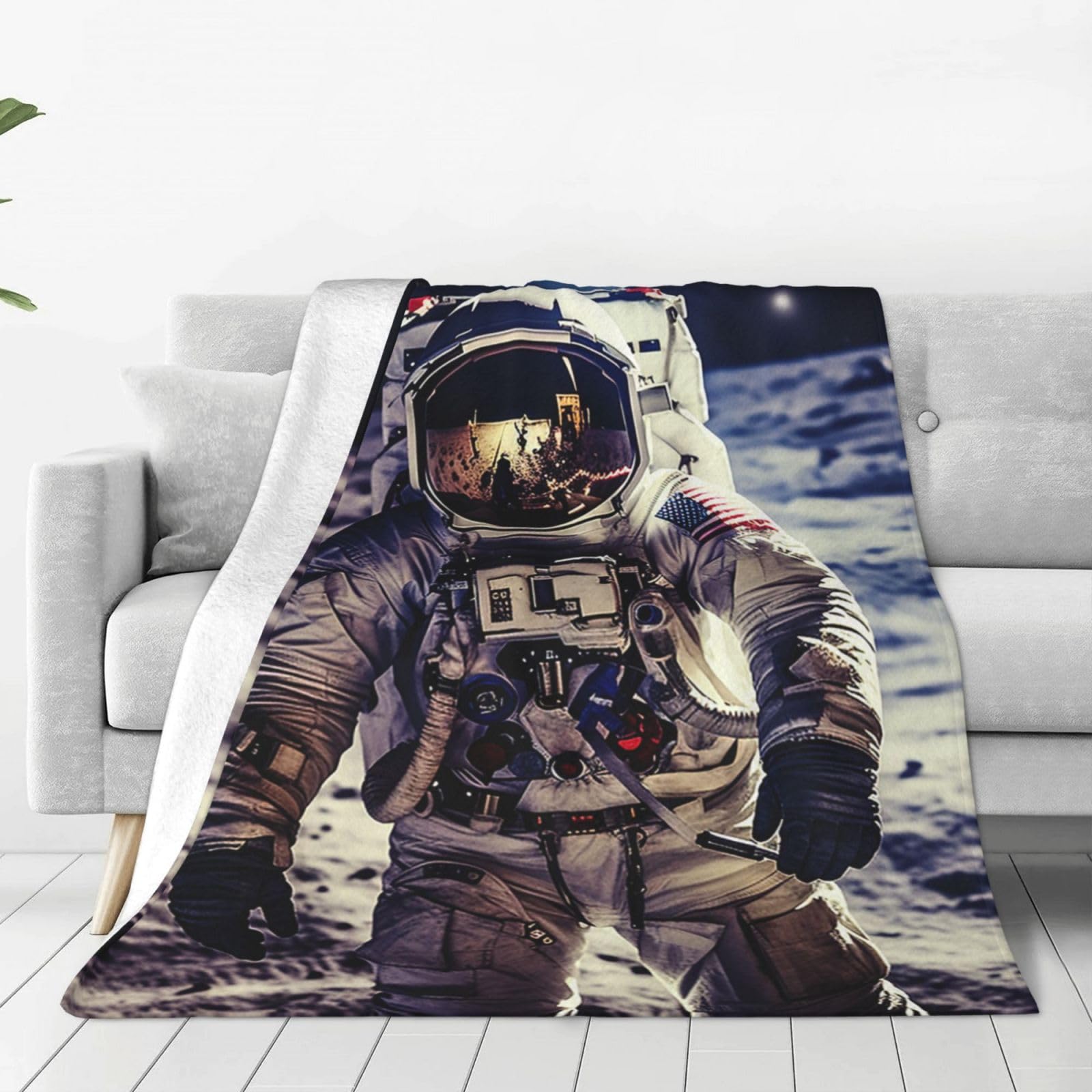 Couverture de voyage astronaute pour des soirées cocooning confortables sur le canapé