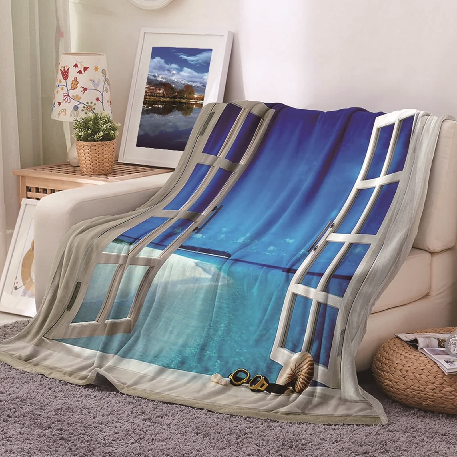 Couverture polaire bleue et blanche pour soirées cocooning chambre