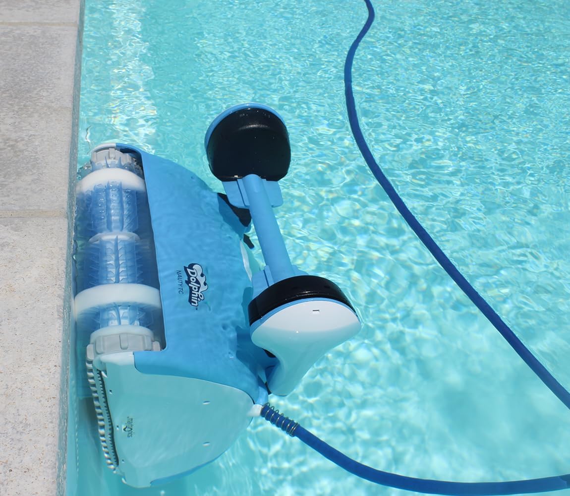 Dolphin Nauty TC cleaning a pool wall