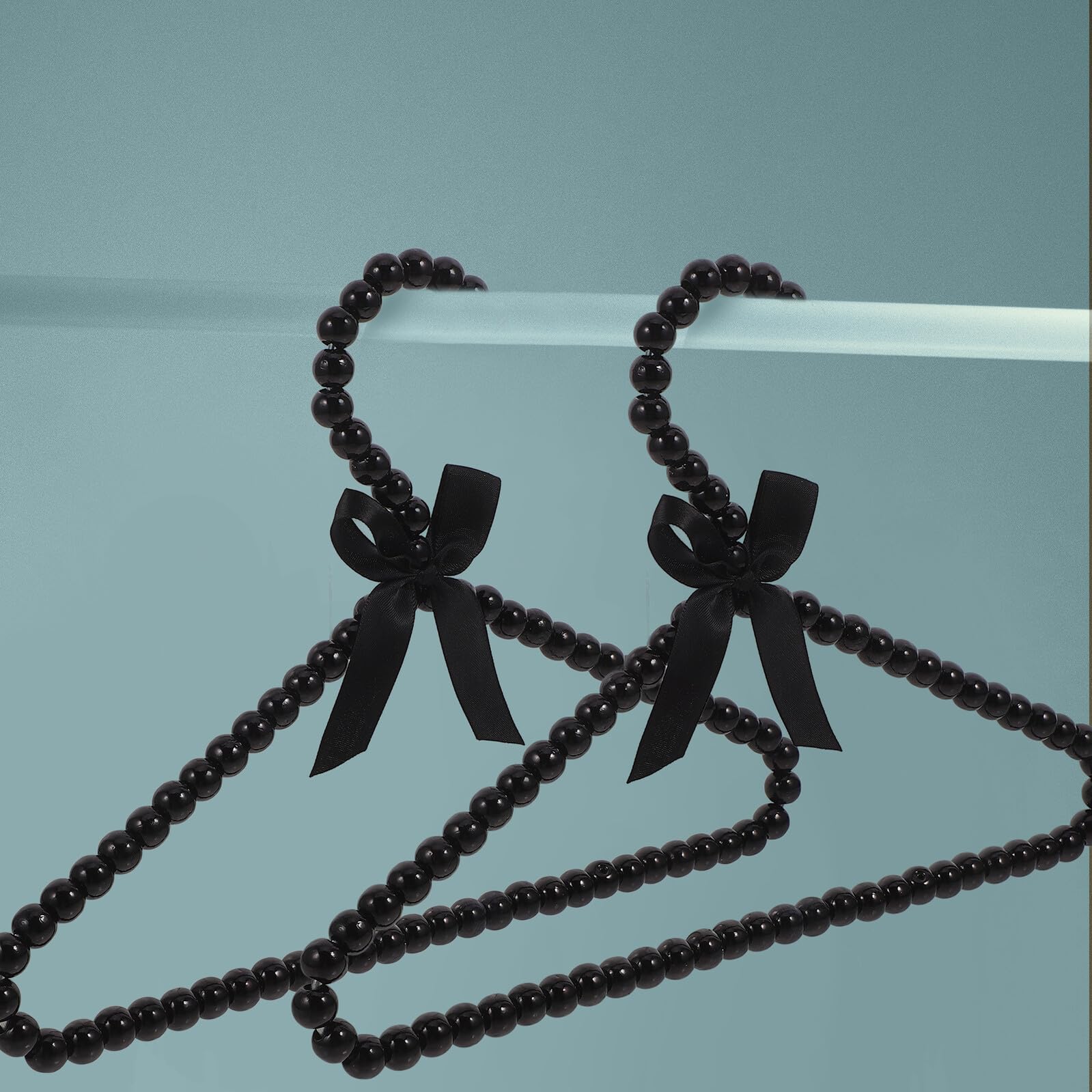 SHINEOFI 12 Perchas Infantiles de Plástico Negro con Diseño de Lazo, Elegantes y Decorativas para Ropa de Niño y Ñiño, Ahorro de Espacio y Organización
