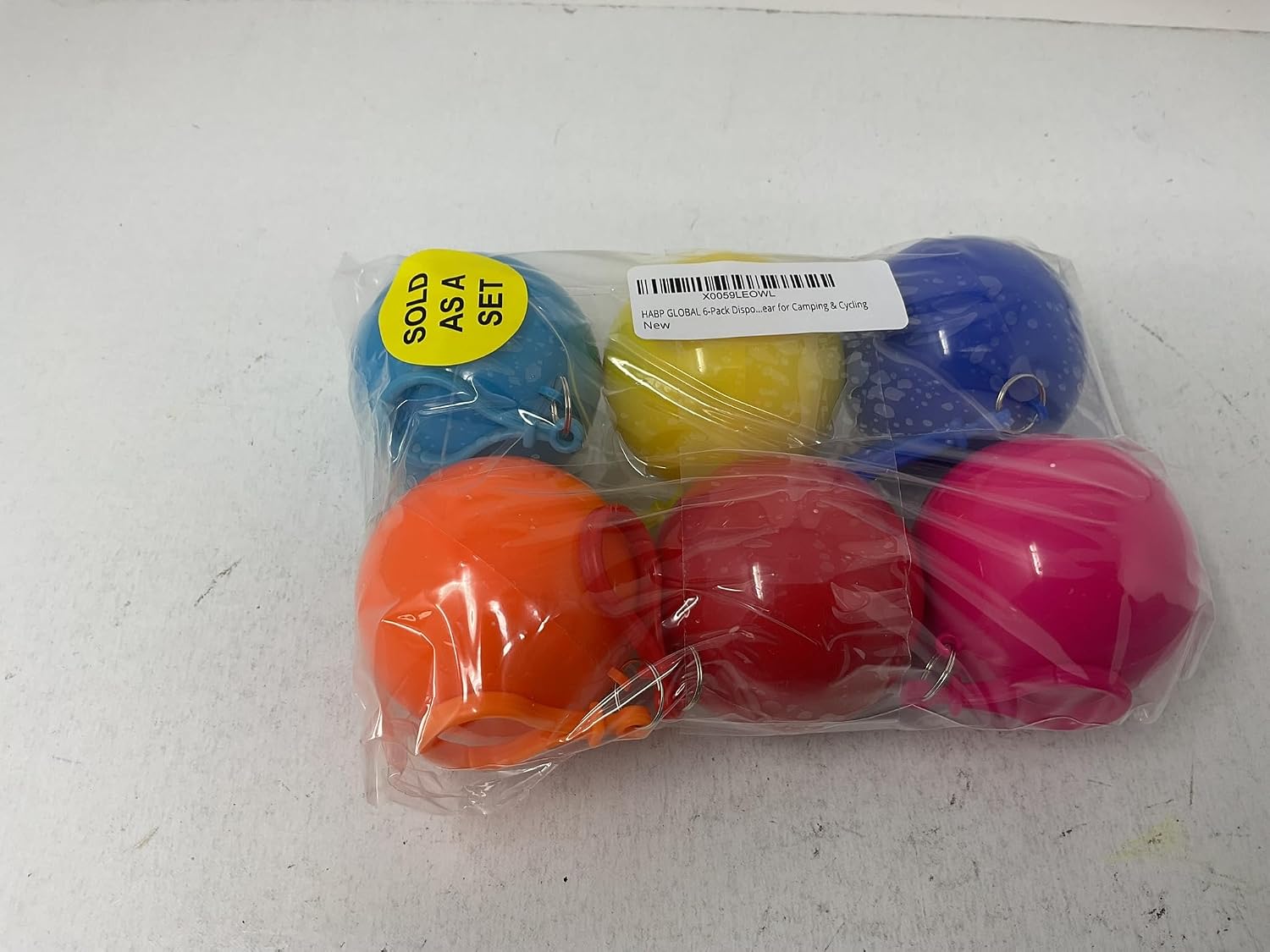 6-Pack Disposable Emergency Rain Ponchos – Waterproof Raincoats with Keychain Ball – Color may vary
