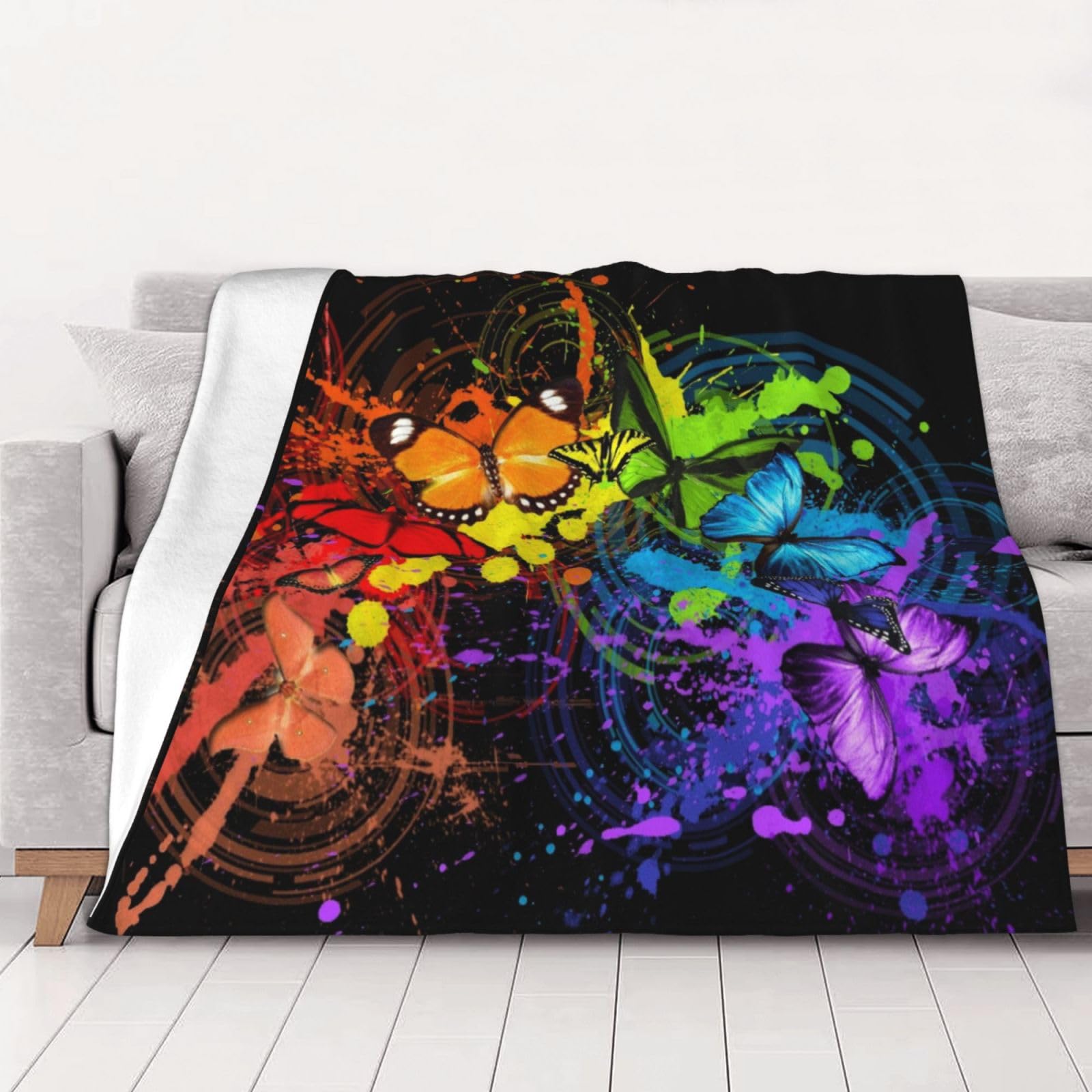 Couverture flanelle papillons douce pour vos soirées sur le canapé