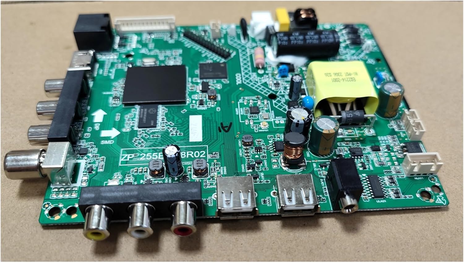 Angled view of the JOTTDSYL ZP.255E.818R02 Smart TV Motherboard, highlighting the main processor area and various connectors.