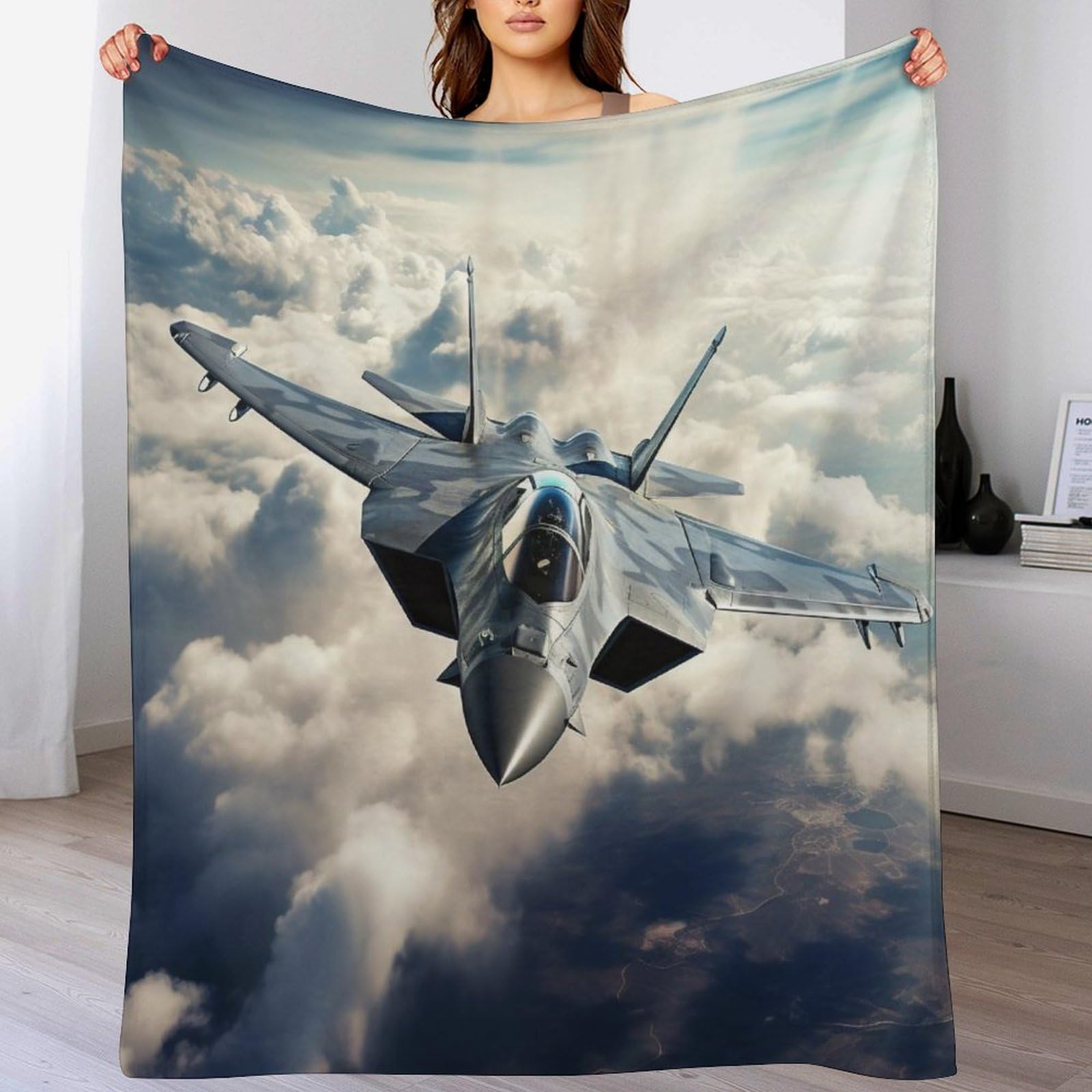 Couverture avion de chasse en flanelle contre les frissons du soir sur le canapé