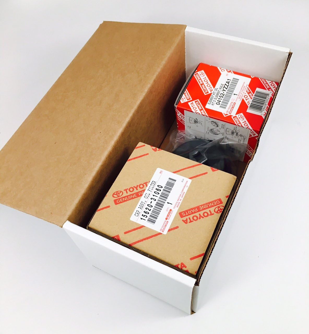 Genuine 04152-YZZA1 oil filter with Genuine 15620-31060 Oil Filter Housing Cap and 15643-31050 Cap Plug includes APSG Wrench and crush washer.