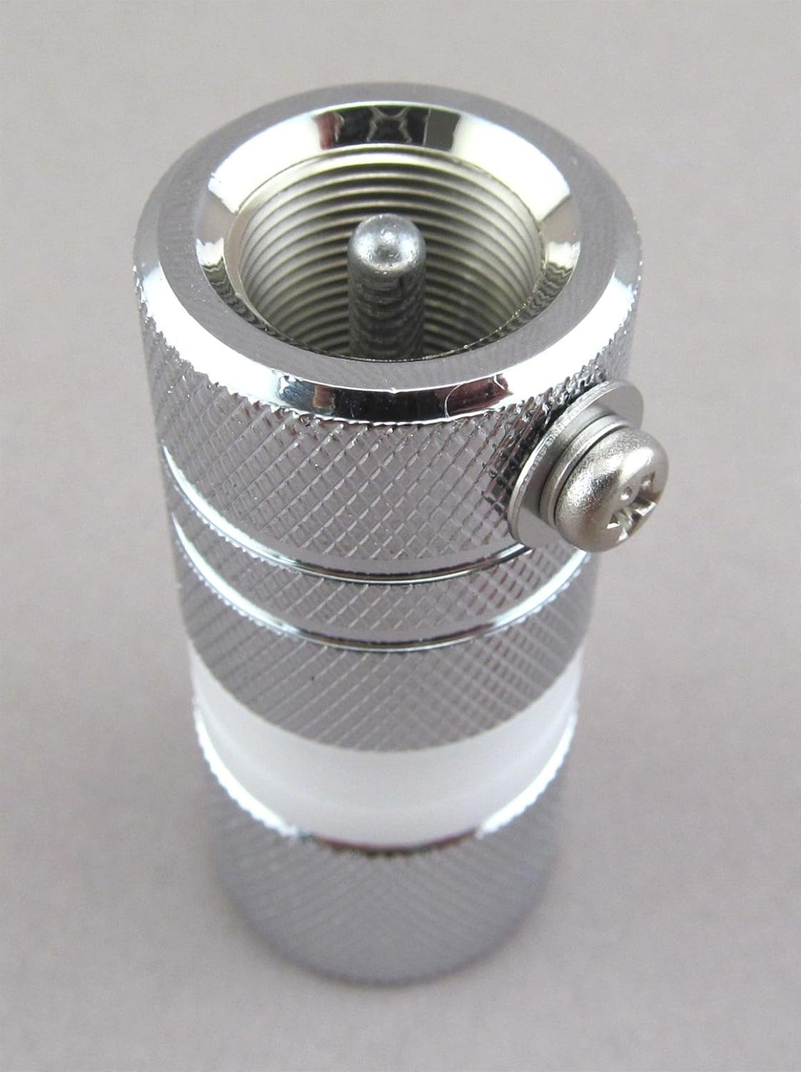 Comet AD-35M Antenna Mount Adapter showing the 3/8-24 threaded stud and grounding screw