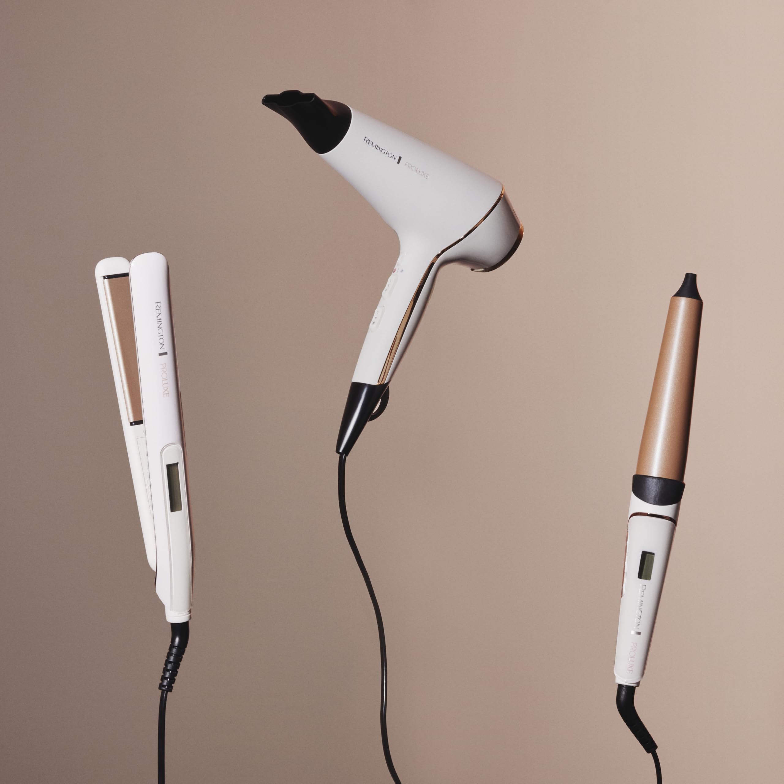 Remington Asciugacapelli Professionale 2400W - Teconologia OPTIheat per risultati di lunga durata - 3 accessori styling, cura ionica, Anti crespo, Motore di lunga durata - PROluxe AC9140