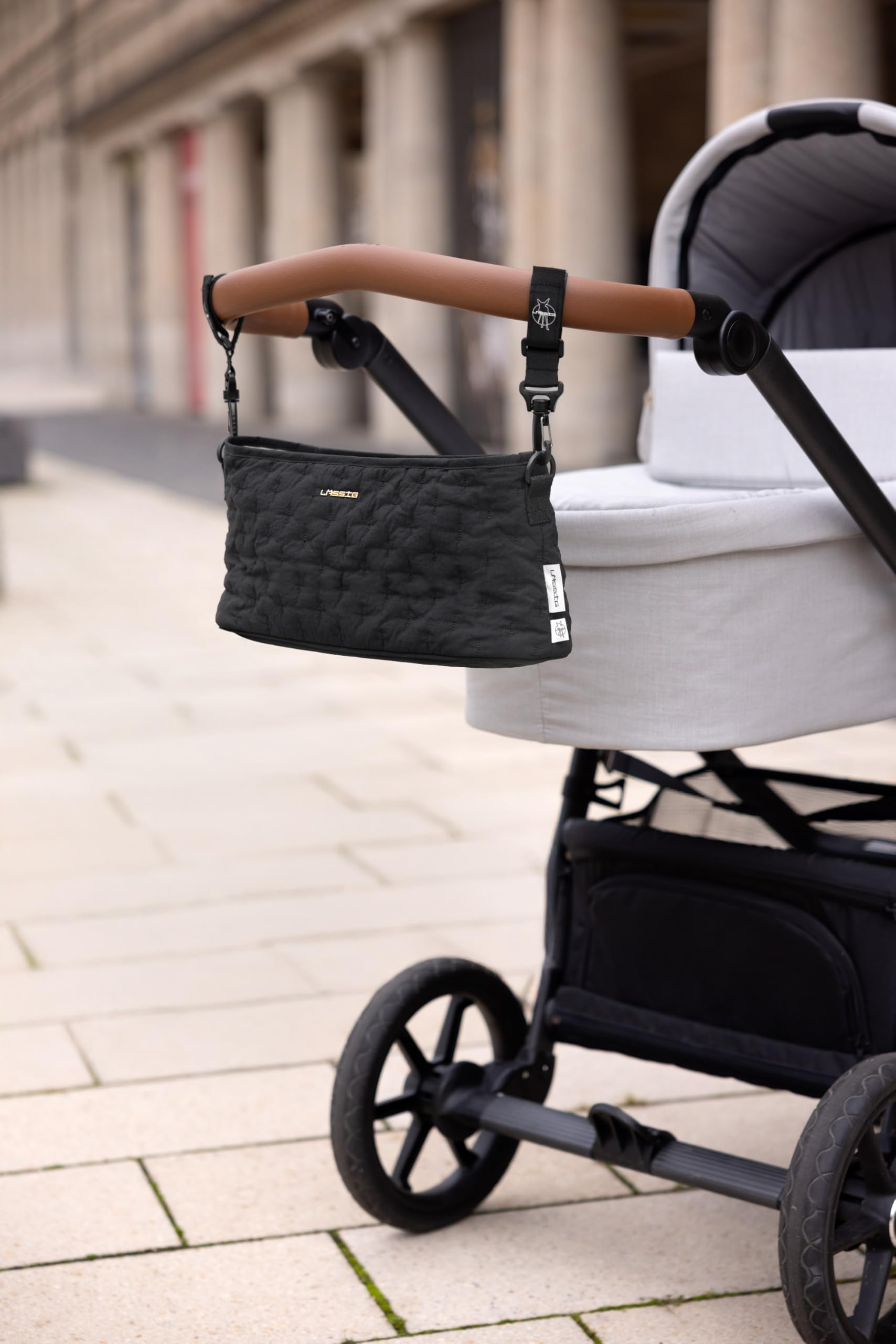 LÄSSIG Organiseur pour poussette avec système de fixation Noir matelassé