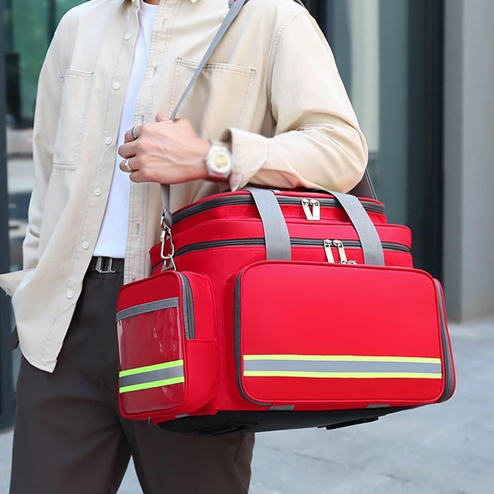 Bolsa de emergencia con múltiples bolsillos, mochila portátil de primeros auxilios con asa y correa para el hombro, diseño de tira reflectante para cuidado de la salud, viajes y rescate al aire libre