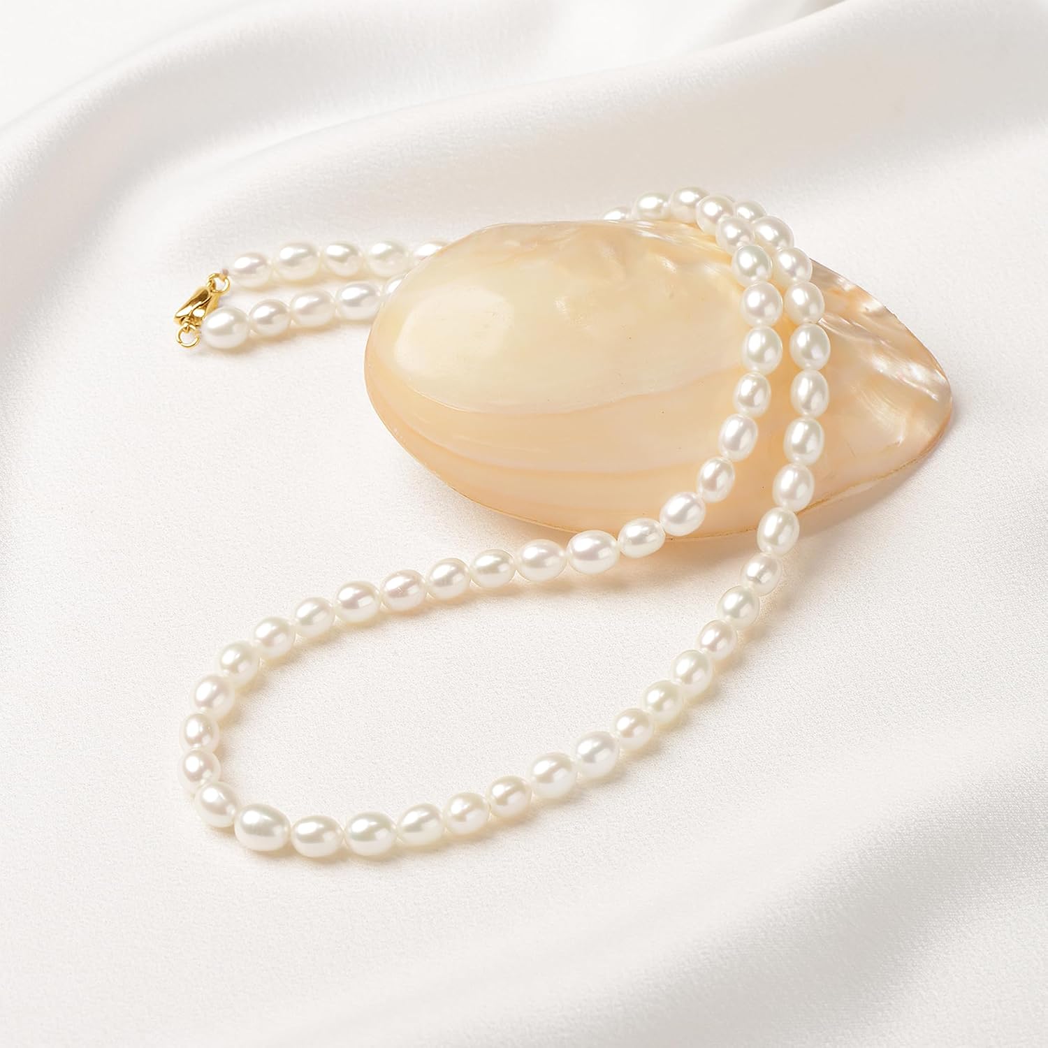 Impalsory Freshwater Pearl Strand Necklace for Women, 18 Inch, AAAA Quality | AAAA quality white cultured pearls in an 18-inch strand with a sterling silver clasp; classic choker style