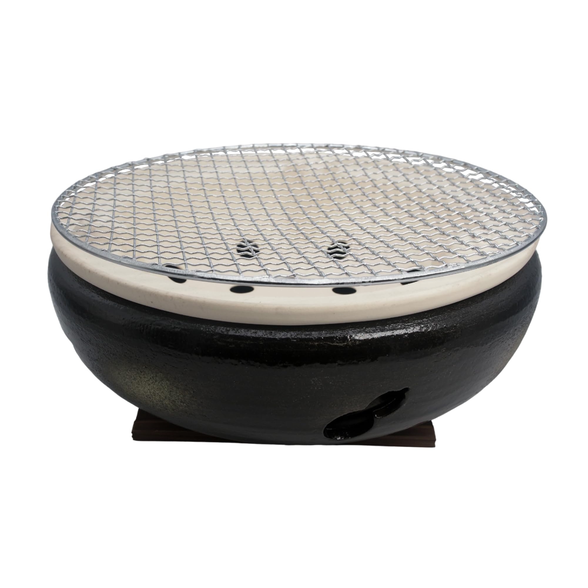 Grill japonais de table au charbon de bois pour repas conviviaux sur la terrasse
