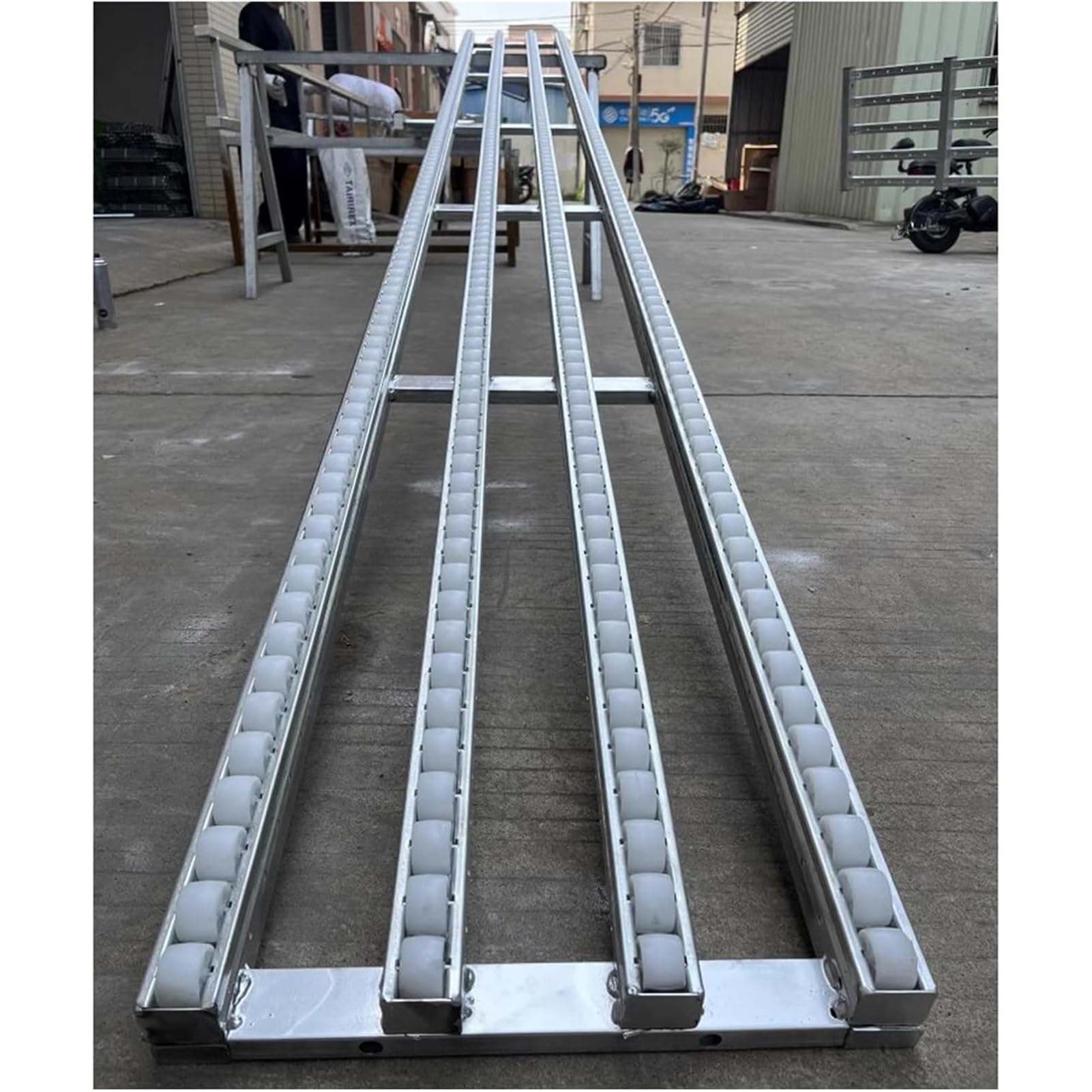Table à rouleaux portable pour déchargement de camions et manutention en atelier