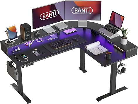 BANTI Triple Motor 63 L-Shaped Standing Desk with LED Light Strip and Power Outlet, Height Adjustable Standing Corner Desk with Ergonomic Monitor Stand, Black Top