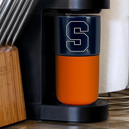 Miniatura 466 de Rico Industries NCAA Miami of Ohio Redhawks - Vaso de cerámica de 16 onzas con agarre de silicona, grabado láser profundo, diseño de color negro