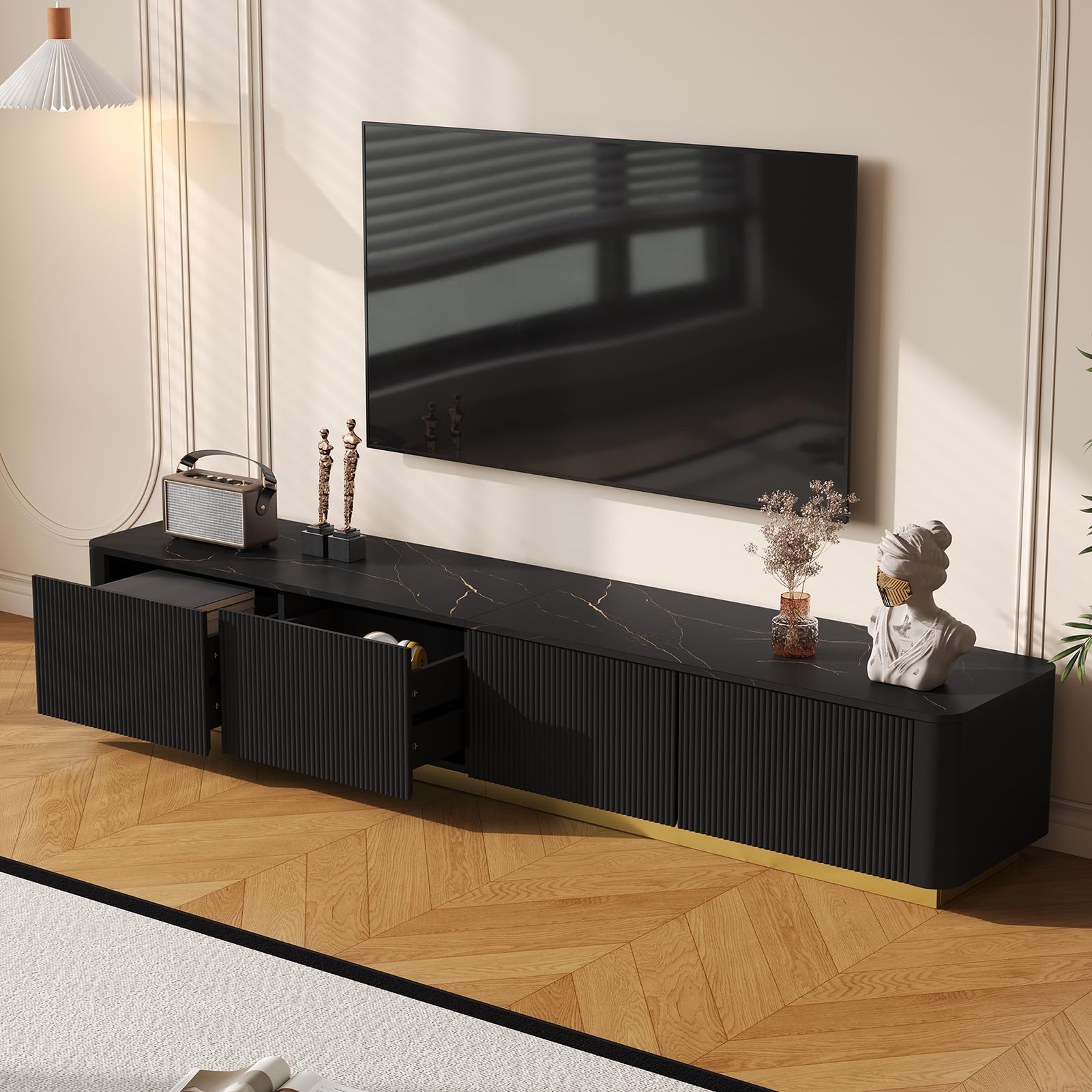 Modern Fluted TV Stand for TVs Up to 85", Curved Profile Design Entertainment Center with 4 Drawers Faux Marble Tabletop Media Console TV Cabinet with Gold Base for Living Room, Black
