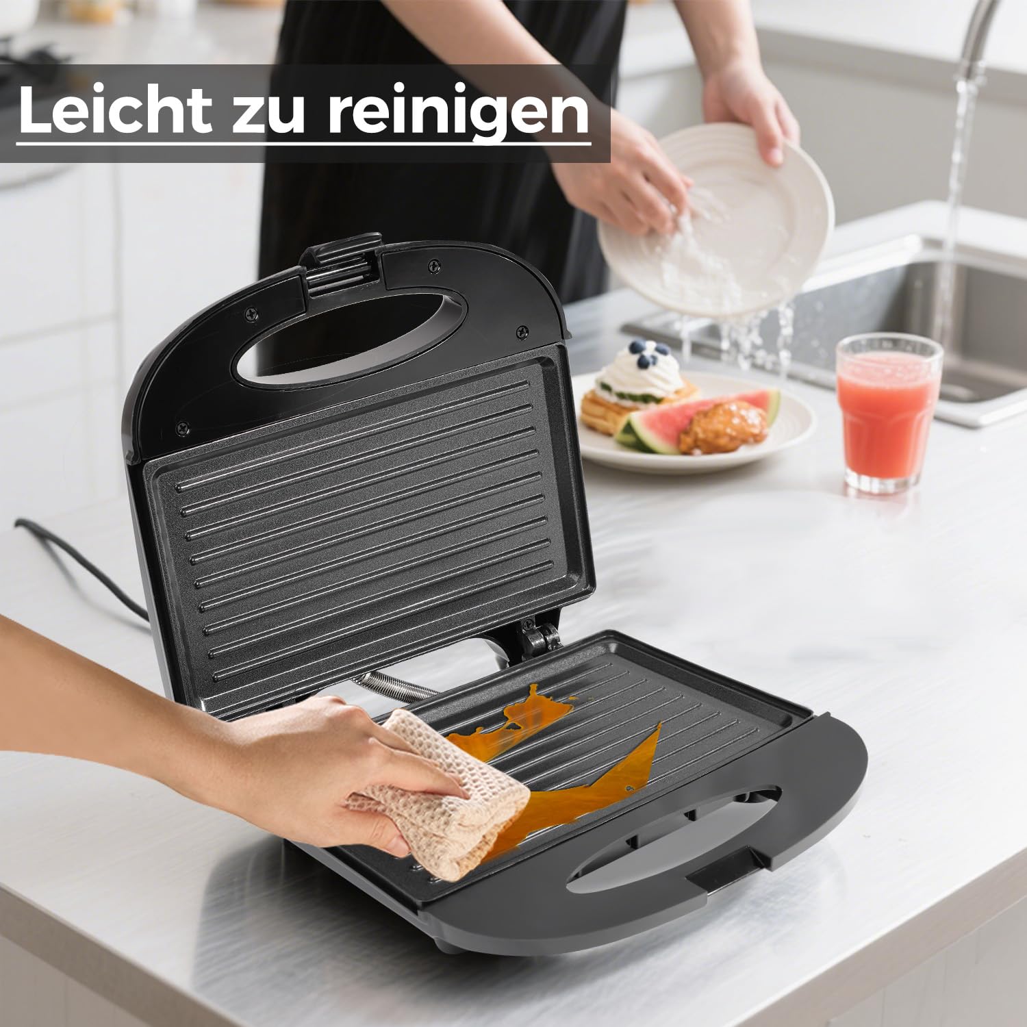 Nirva Appareil à sandwichs double - 750 W, Revêtement antiadhésif, forme classique à deux compartiments pour 2 sandwichs, chauffe rapidement, poignée isolée thermiquement, noir