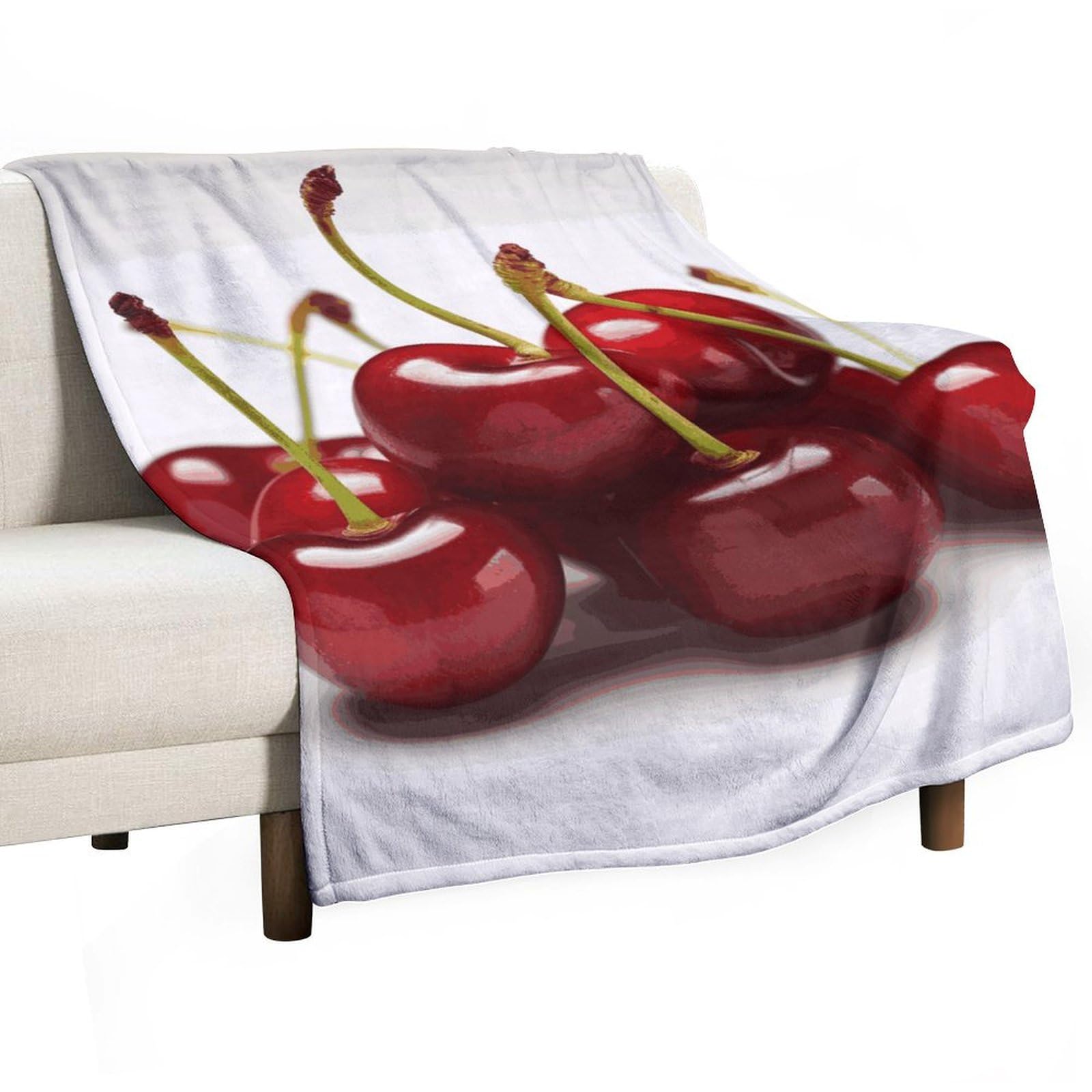 Couverture polaire cerises contre le froid nocturne : lit et canapé douillets garantis