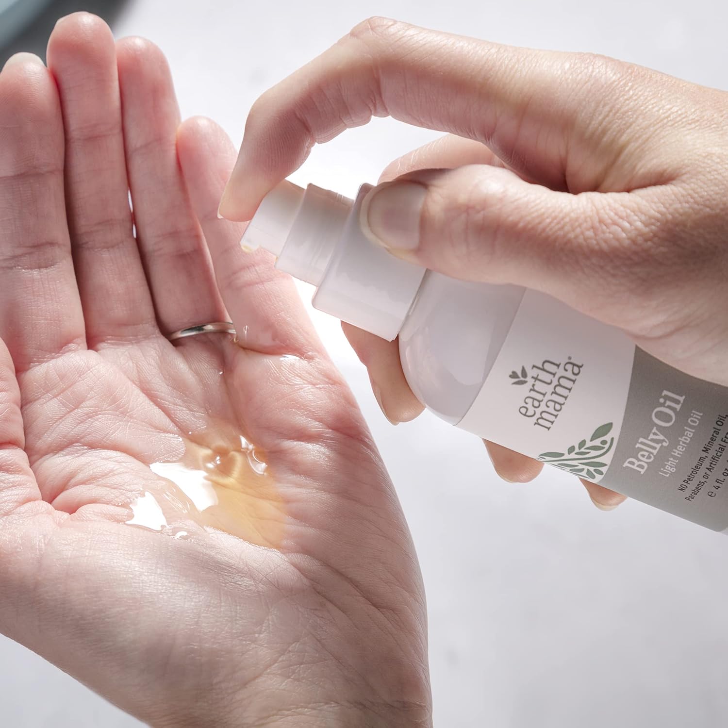 Belly Oil by Earth Mama | To Safely Moisturize and Promote Skin's Natural Elasticity During Pregnancy and to Ease the Appearance of Stretch Marks, 4-Fluid Ounce (Packaging May Vary) : Beauty & Personal Care