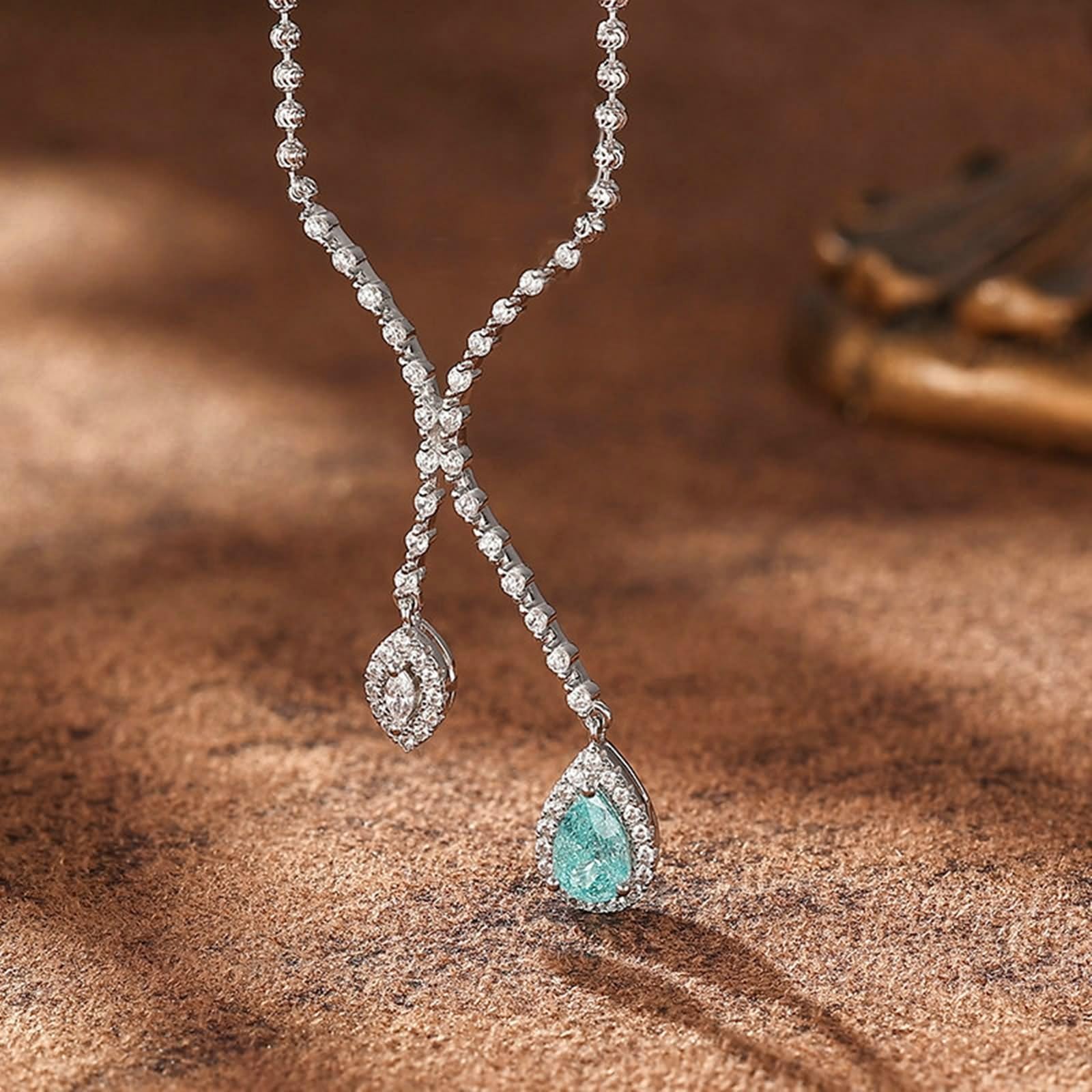 Łańcuszek przyjaźni damski, łańcuszek na szyję z wisiorkiem Infinity z turmalinem Paraiba i moissanit 18-karatowe białe złoto 45 cm