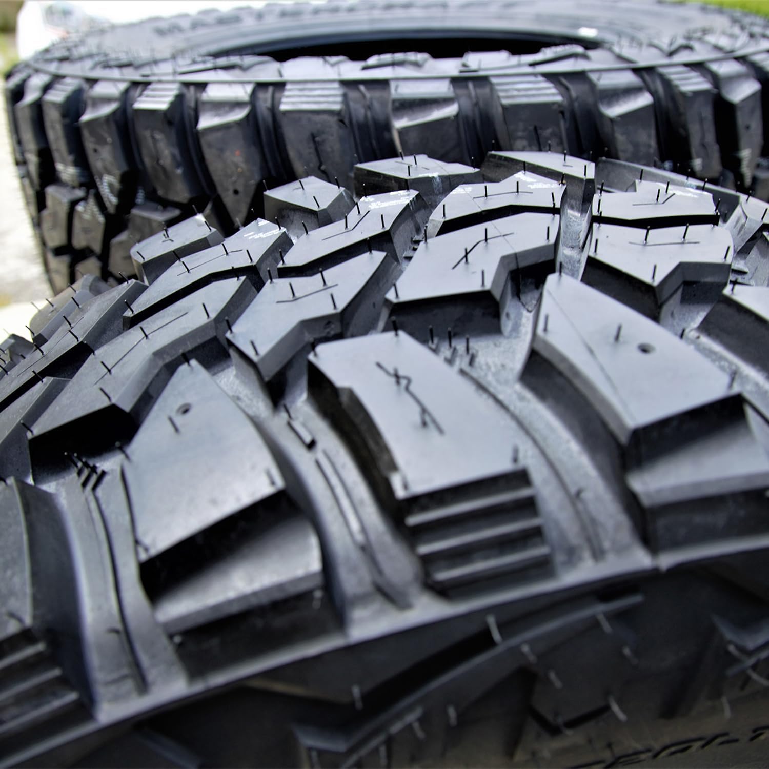 Close-up of Mastercraft Courser Mxt tire tread blocks