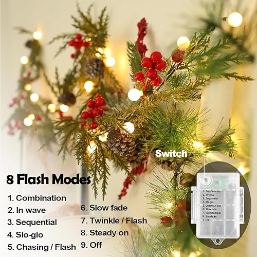 Miniatura 4 de Guirnalda de Navidad de 6 pies, 20 bombillas LED, guirnalda de pino de ciprés con luces, funciona con pilas, campanas de temporizador, bayas rojas,