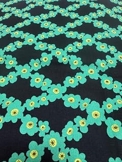綿キャンバス生地110cm×100cm黒地にグリーンの花柄