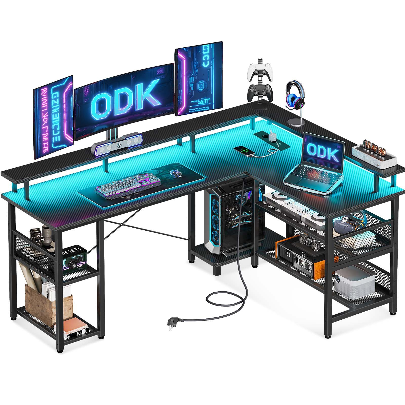 ODK Mesa Gaming con LED, Escritorio Gaming Reversible con 2 Enchufes y 2 Puertos USB, Escritorio Esquinero Grande con Estante de Malla, Fibra de Carbono Negra 168×120cm