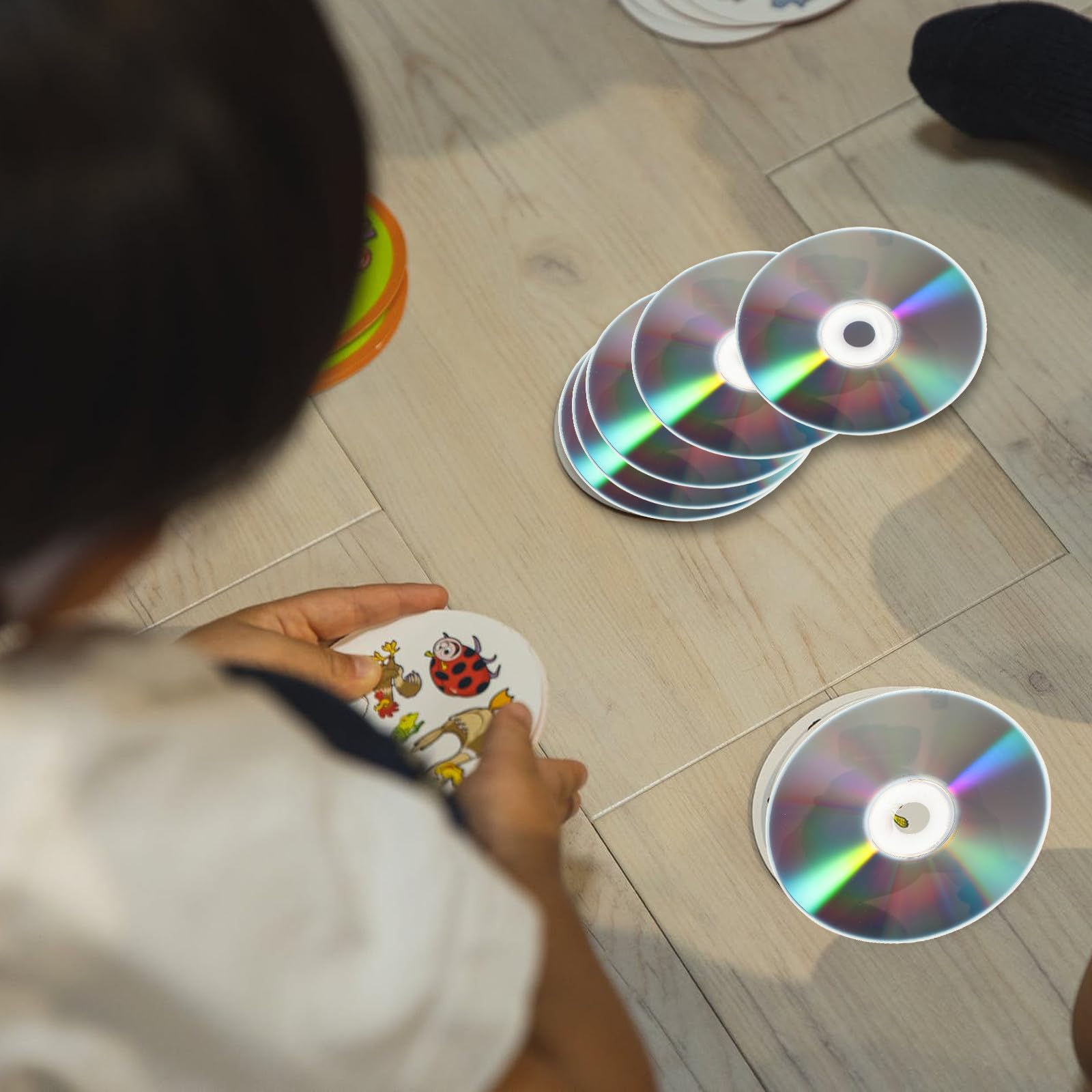 BESPORTBLE Lot de 50 Disques CD Décoratifs DIY Double Face Réfléchissante Multifonctions pour Bricolage Maison Matériel Créatif en Plastique pour Décoration et Activités Manuelles