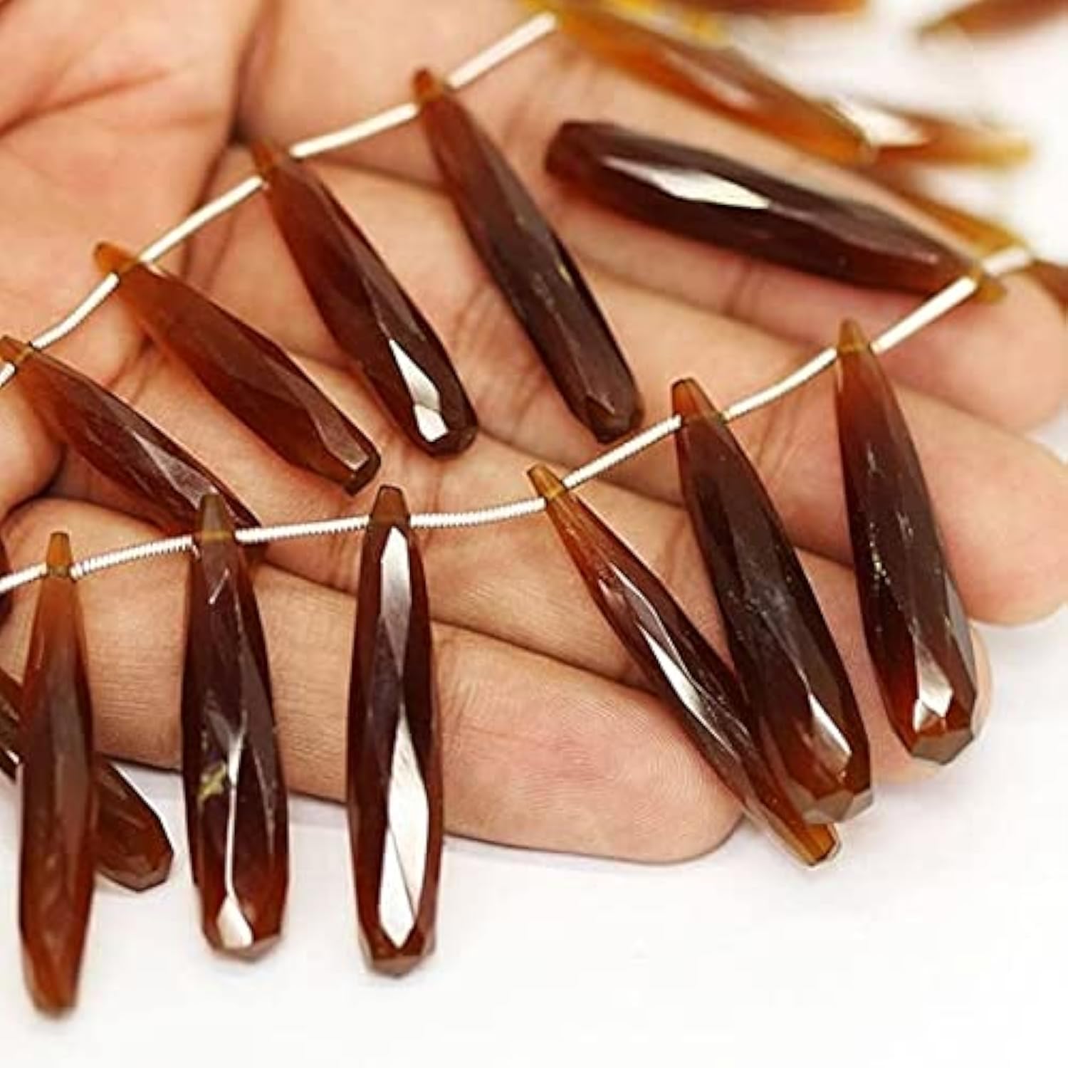 Calcédoine briolette facettée de qualité supérieure couleur miel pour joaillerie artisanale
