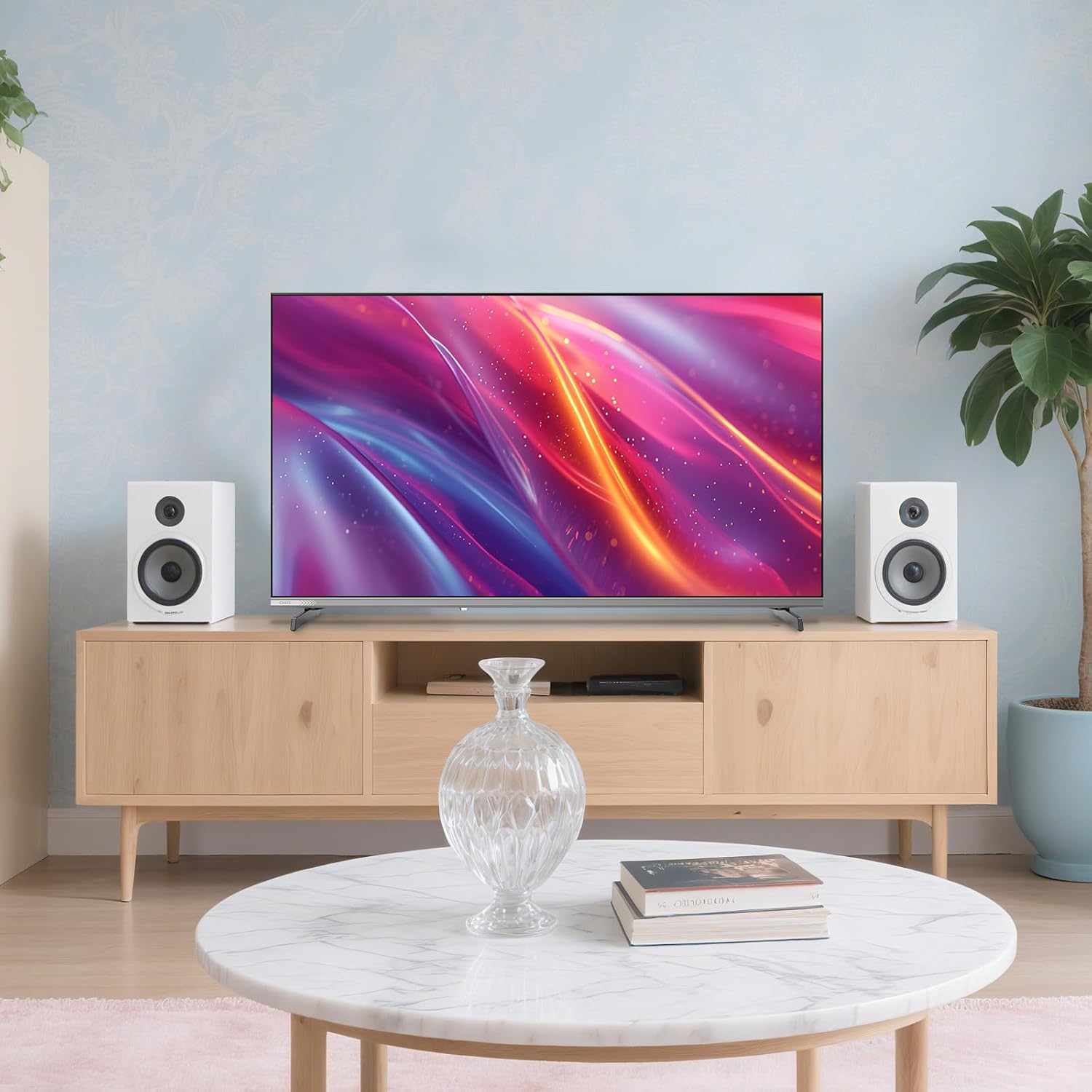 CHiQ L40QST TV placed on a stand in a living room setting