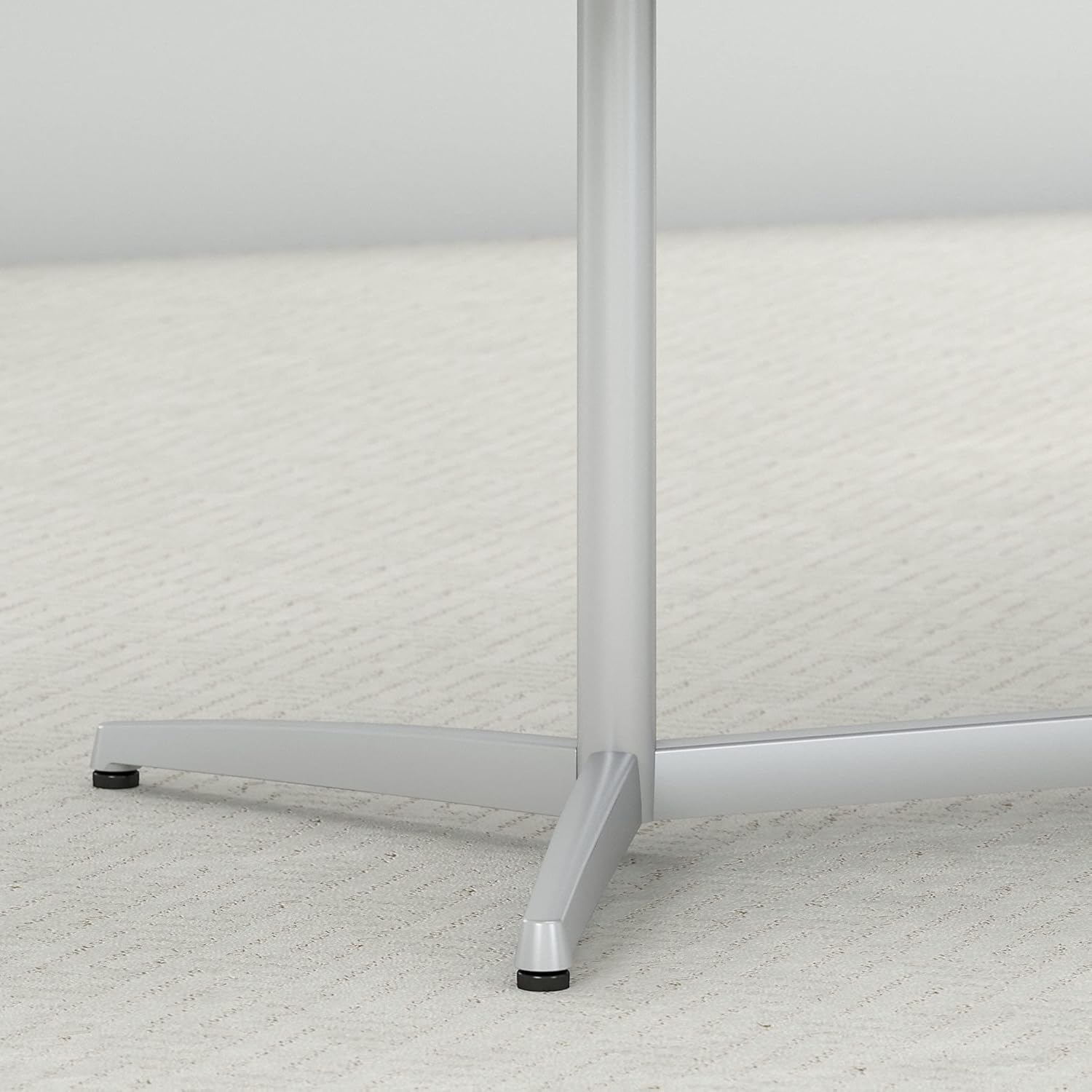 Close-up of the metal base of the conference table