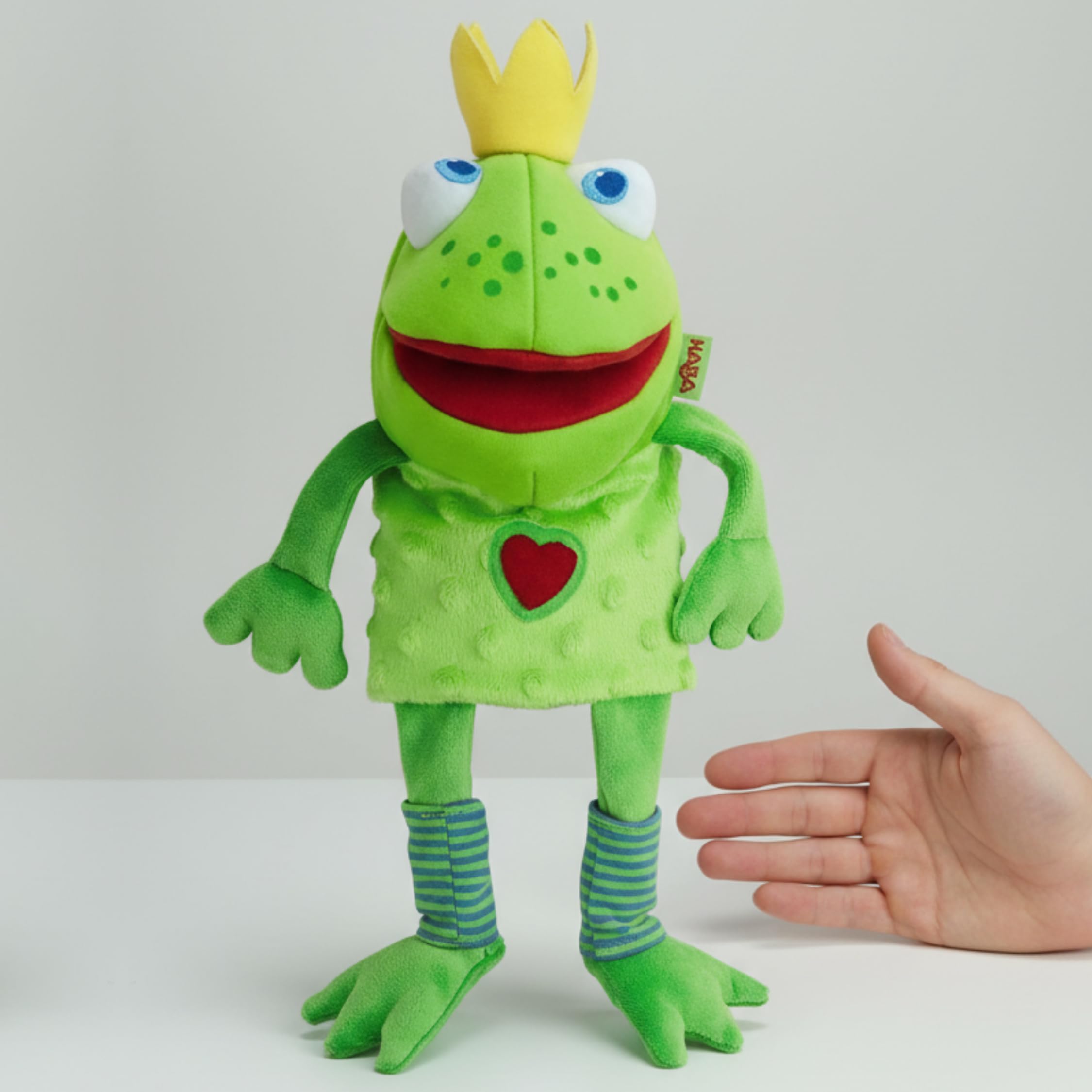 HABA Handpuppe Froschkönig, 26 cm Stoffpuppe mit beweglichem Maul & Knisterfolie, Spielzeug für Rollenspiele & Puppentheater, waschbar, ab 18 Monaten - 1301263001